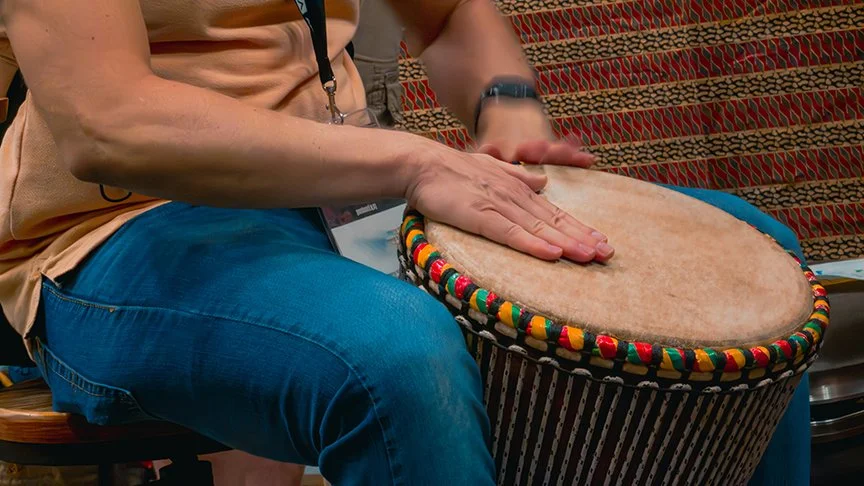 Hands playing drum