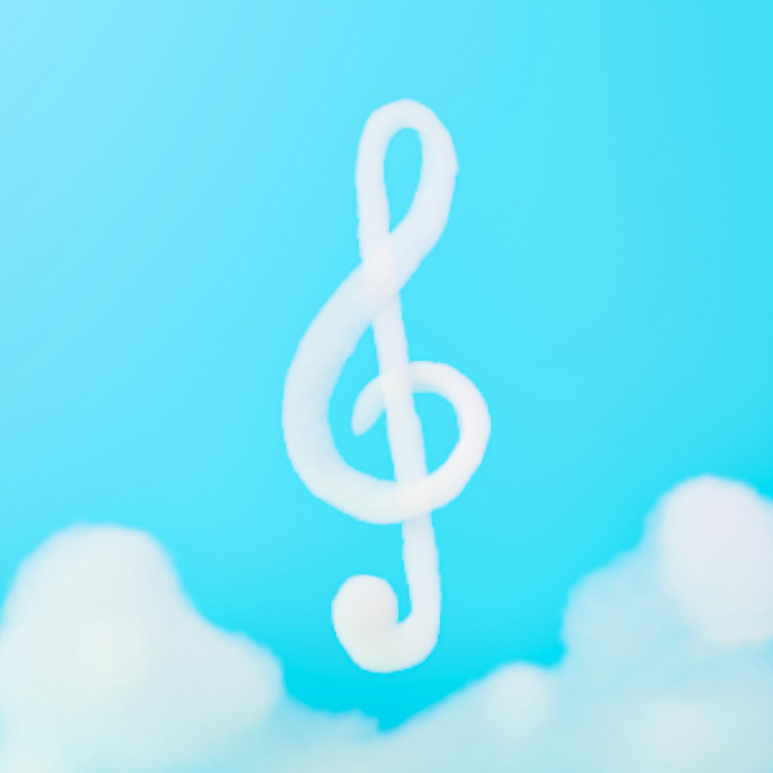 Treble clef made out of a cloud in the sky