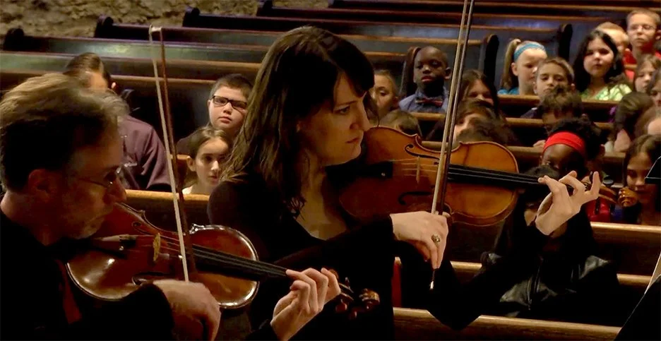 Students at a performance of the KC Chamber Orchestra