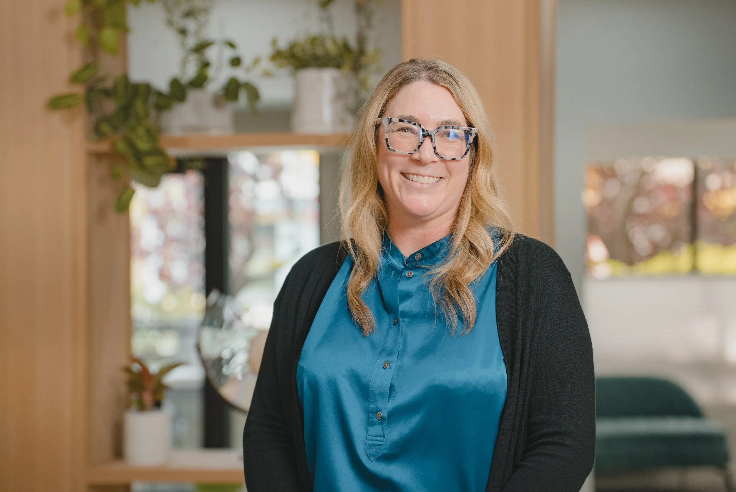 A headshot of a Raymond James Partner, Tiffany.