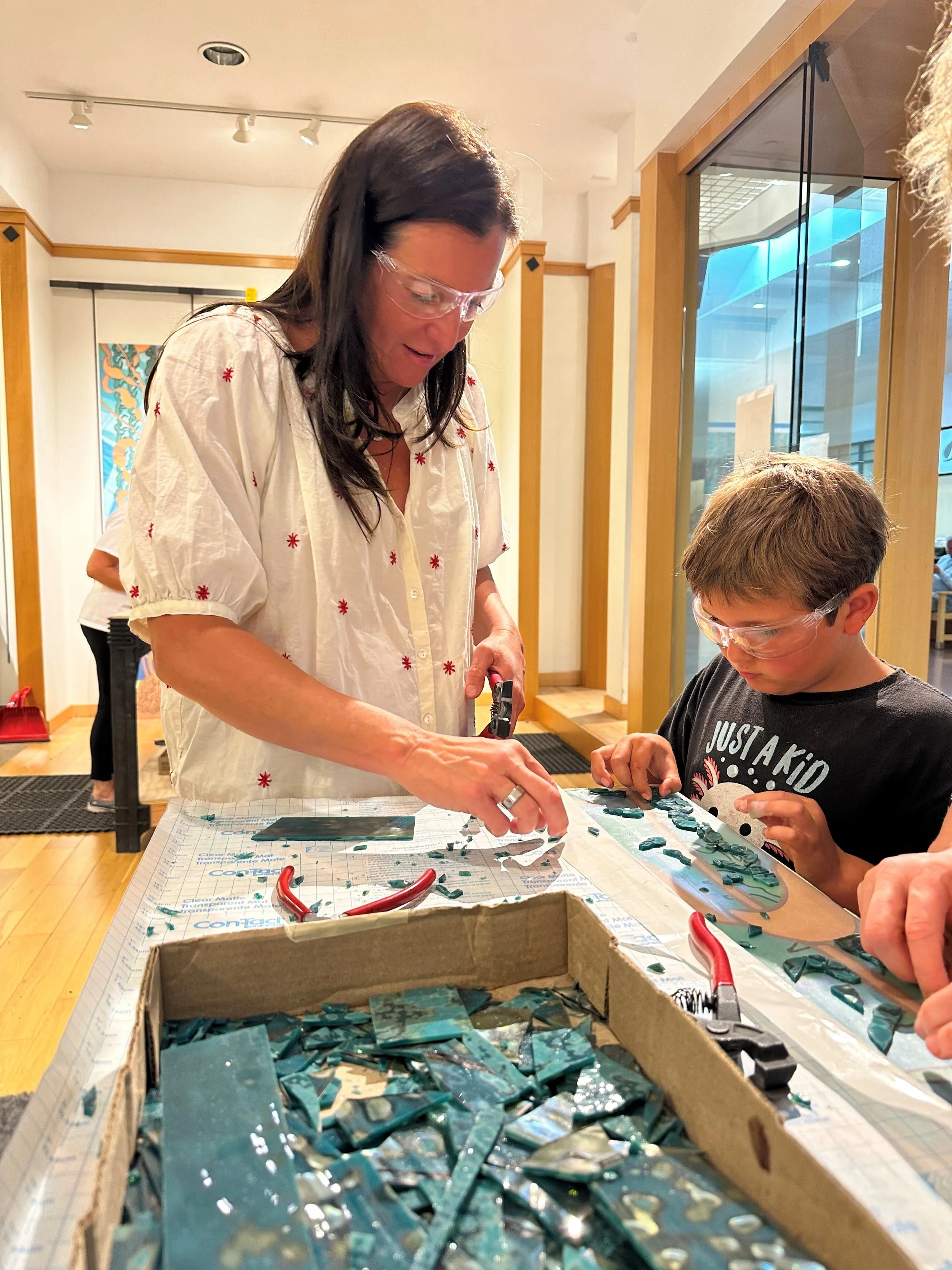 Christine and her son supporting Capitola Wharf Enhancement Project