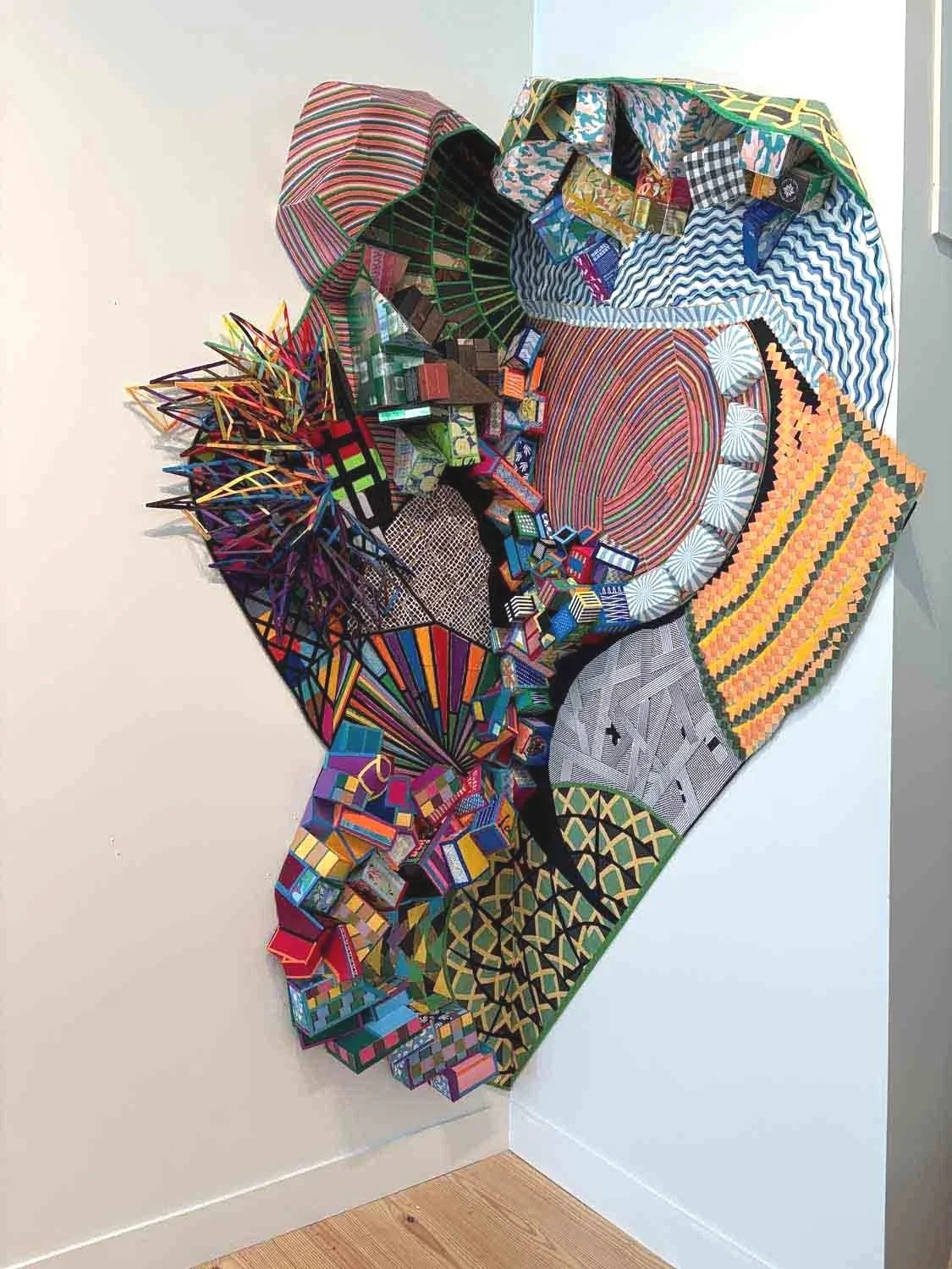   High Switchback , 2025, 96 x 72 x 12 Inches, Cardboard, Felt, Paper. Packaging 