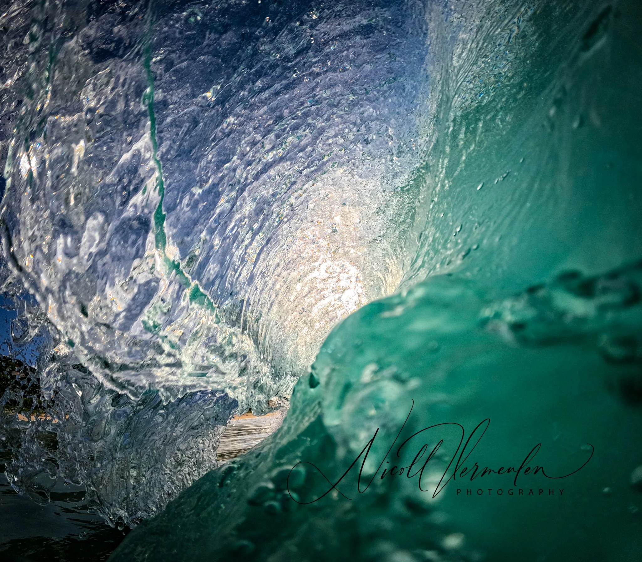 Sunlit Bright Turquoise Blue Ocean Wave Crashing Sea Shore View