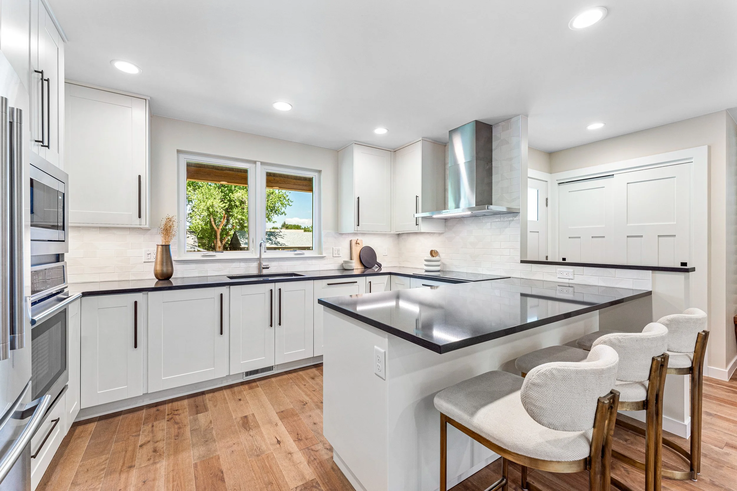 Modern Farmhouse Kitchen quartz counters and undermount lighting Boulder CO