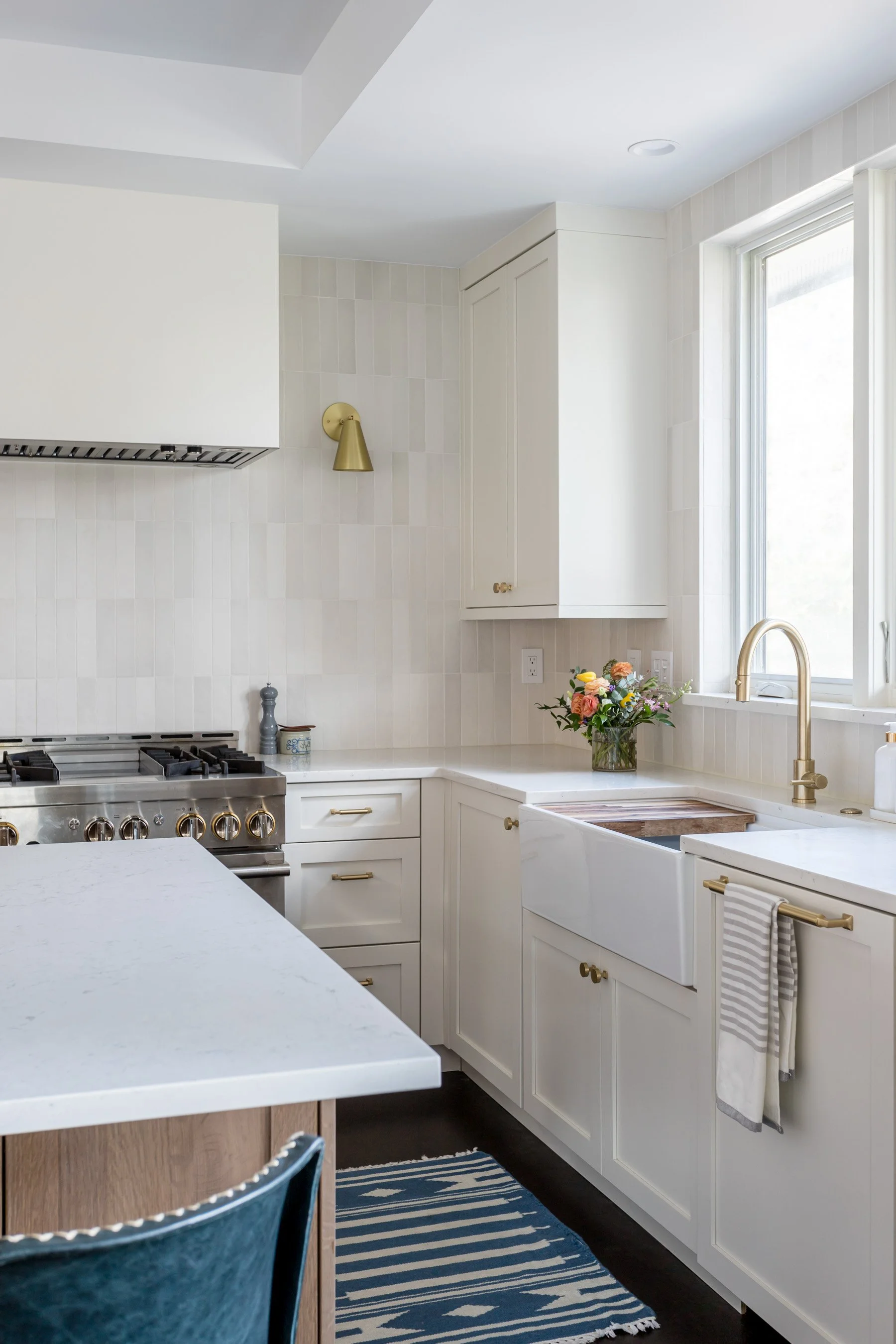 kitchen remodel with tile backsplash custom hood Boulder CO