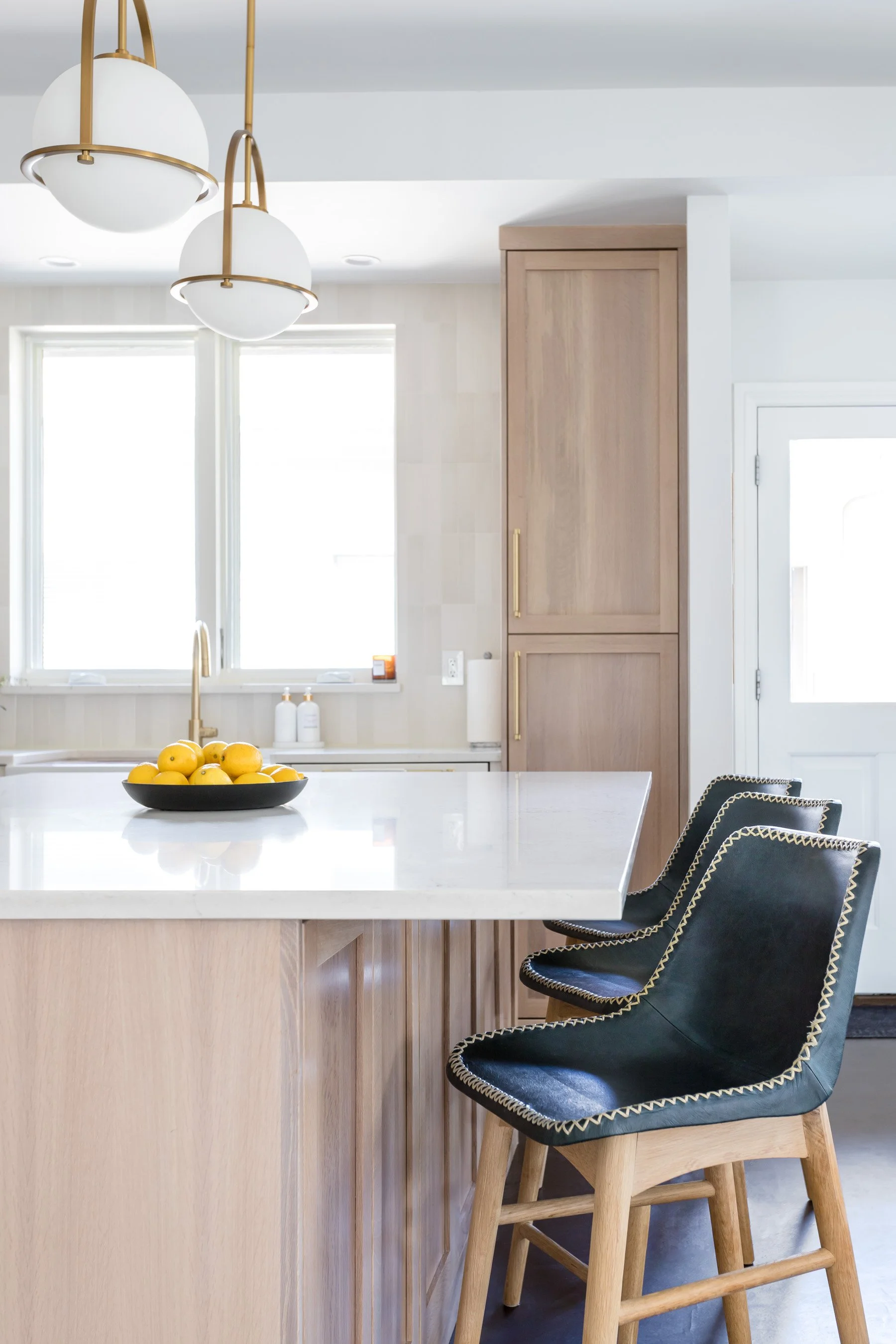 Quartz countertops with quarter sawn white oak cabinetry Boulder CO