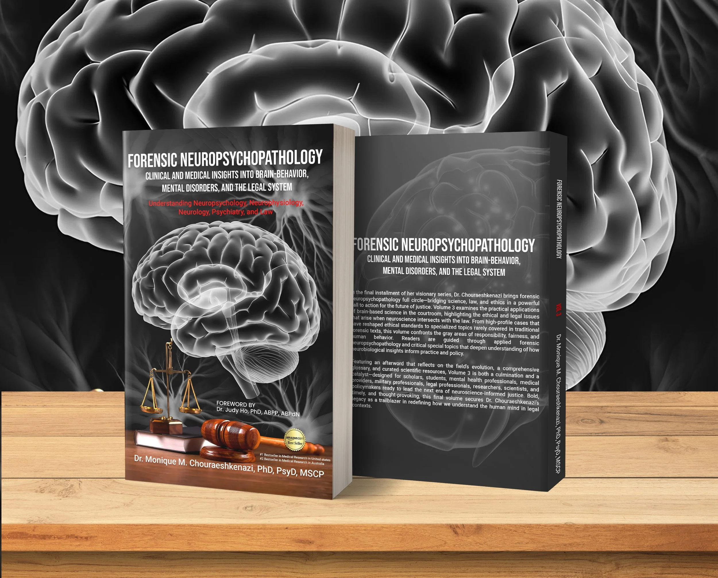 Book titled Forensic Neuropsychopathology standing on a wooden surface, with a background of a brain illustration. Foreword by Dr. Judy Ho, PhD. The cover features a brain graphic and a gavel.