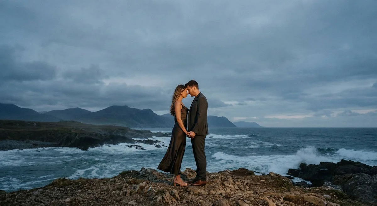 A man proposes to a woman on the beach at sunset under a decorated canopy with the words 'Marry Me' lit up in the background. The man is kneeling with a ring, and the woman appears surprised and emotional.