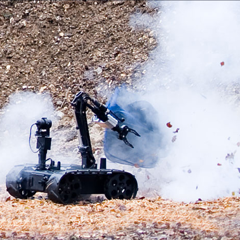 The MMP-30-EOD robot firing a disruptor on a mission.
