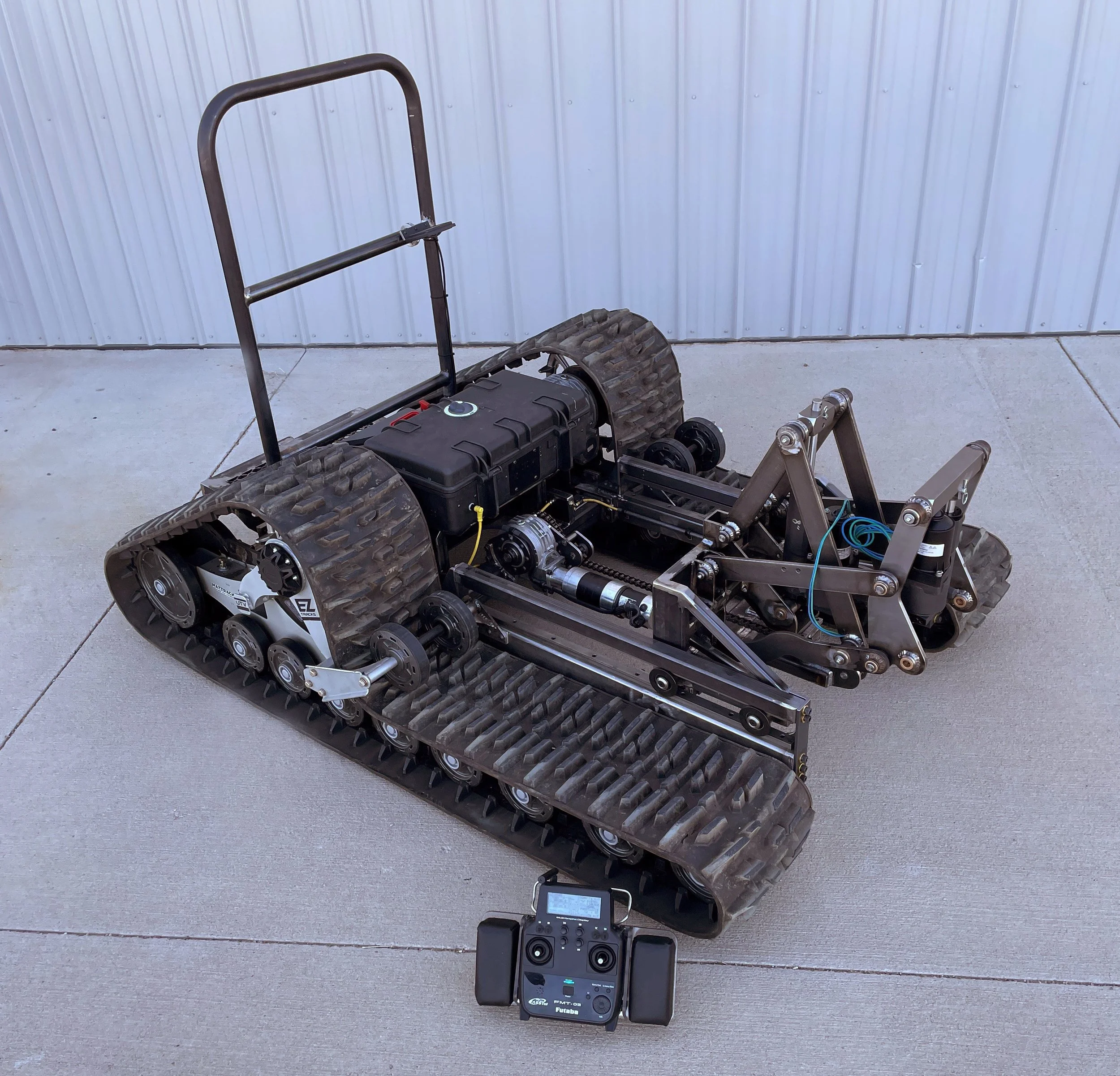 All terrain utility robot platform with tracks and implements