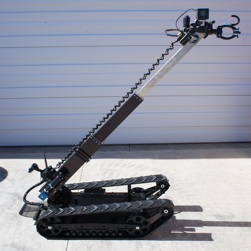 A small, tracked robot with a telescoping arm and a camera. For use by law enforcement.
