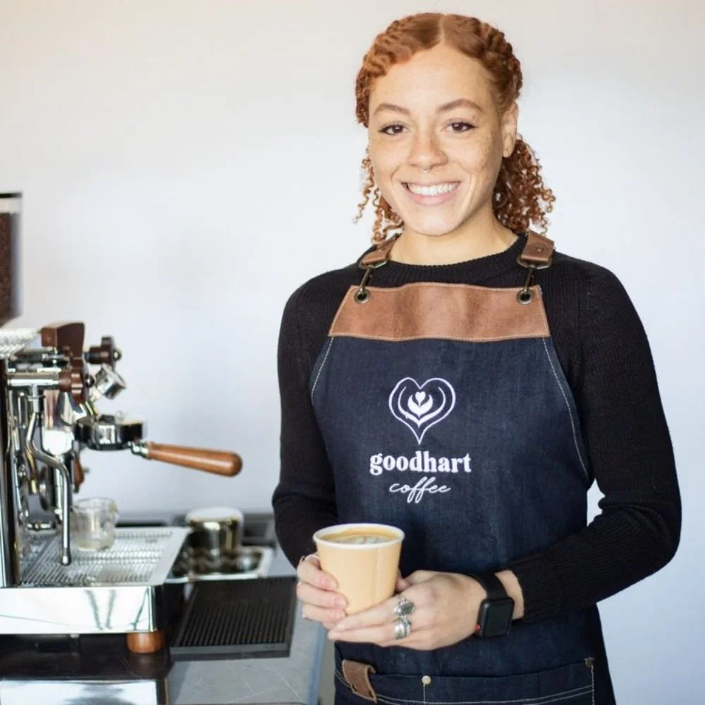 A polished Chicago Coffee Carts mobile espresso cart serving fresh coffee drinks for guests at a Bloomington-area event.