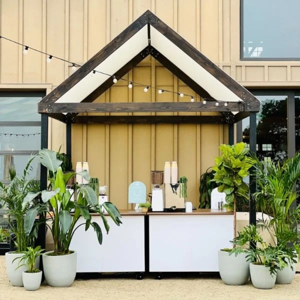 An elegant mobile coffee cart display designed for Bloomington weddings, showers, birthdays, brunches, and private celebrations