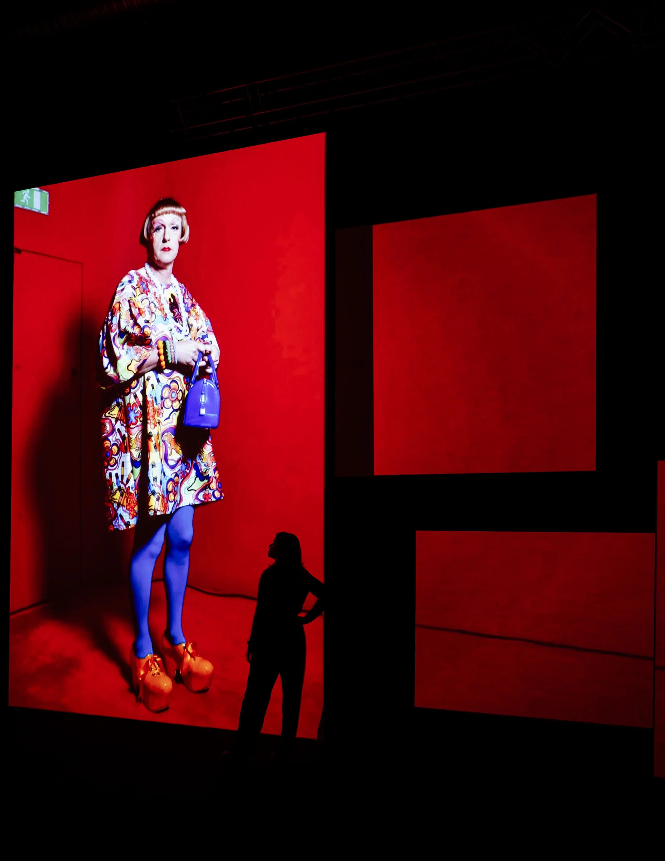 model  looking at multiple screens at the  National Portrait Gallery UNFRAMED exhibition  photography campaign  photo © Antonio Pagano