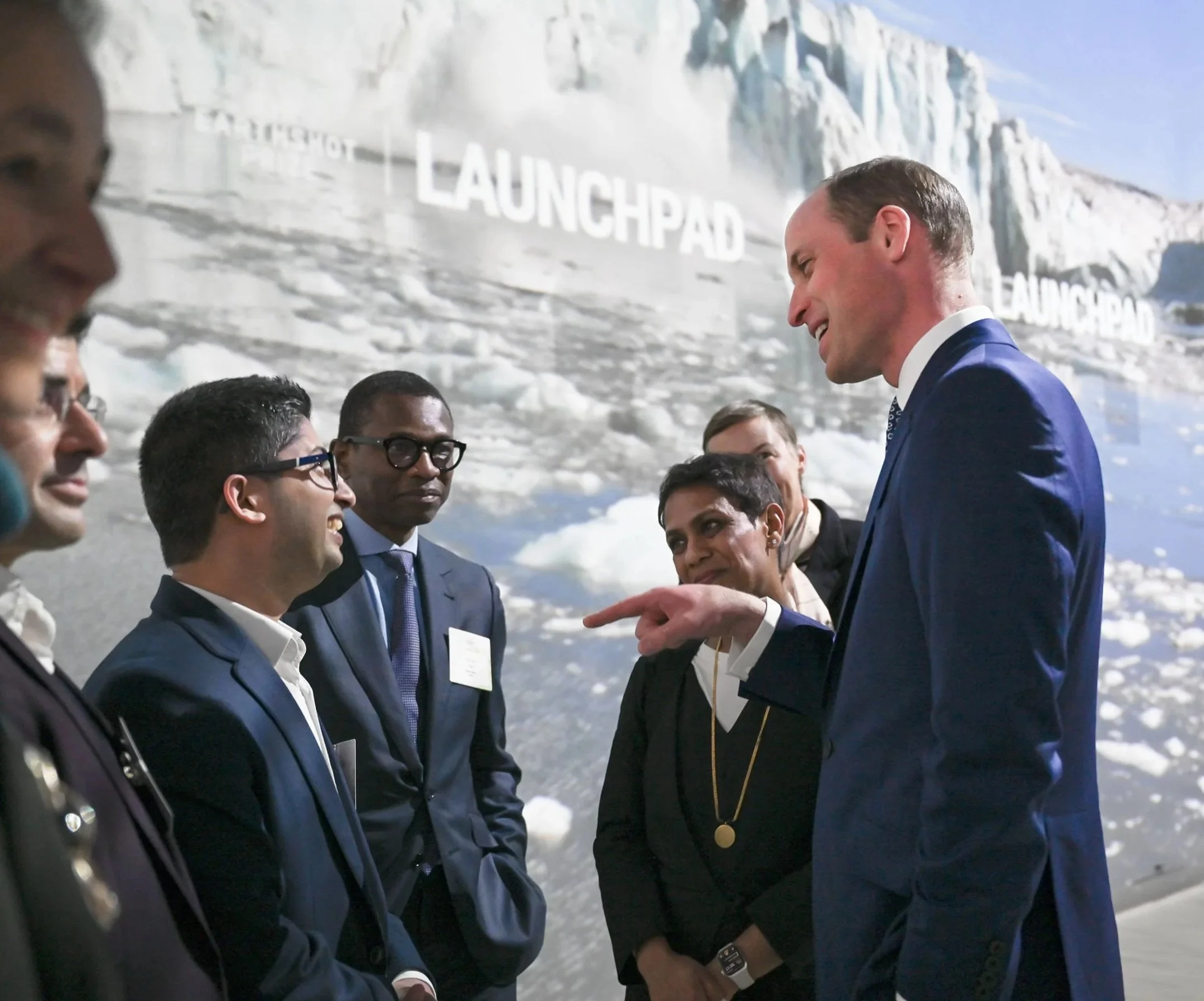 Prince William speaks with various Earthshot partners (including Henry Obi from Helios Investment Partners) at the launch of The Earthshot Prize Launchpad, Frameless Museum, London