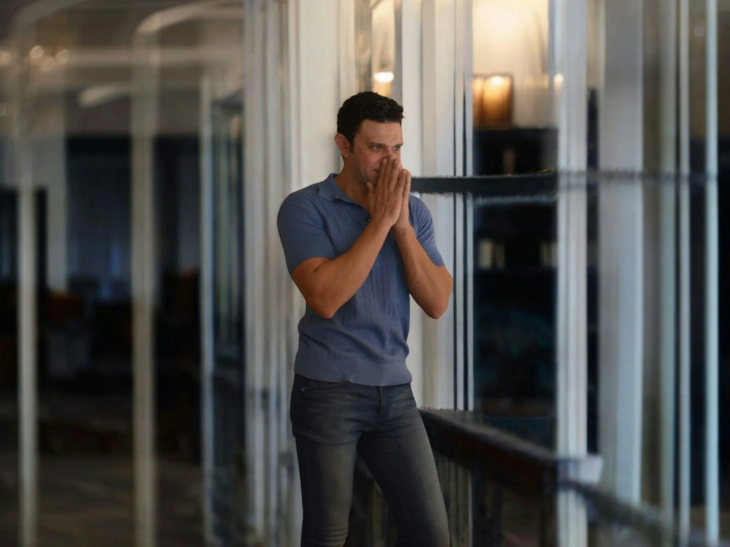 Professional feeling overwhelmed and under pressure before beginning therapy for founders, executives, and high-performing professionals