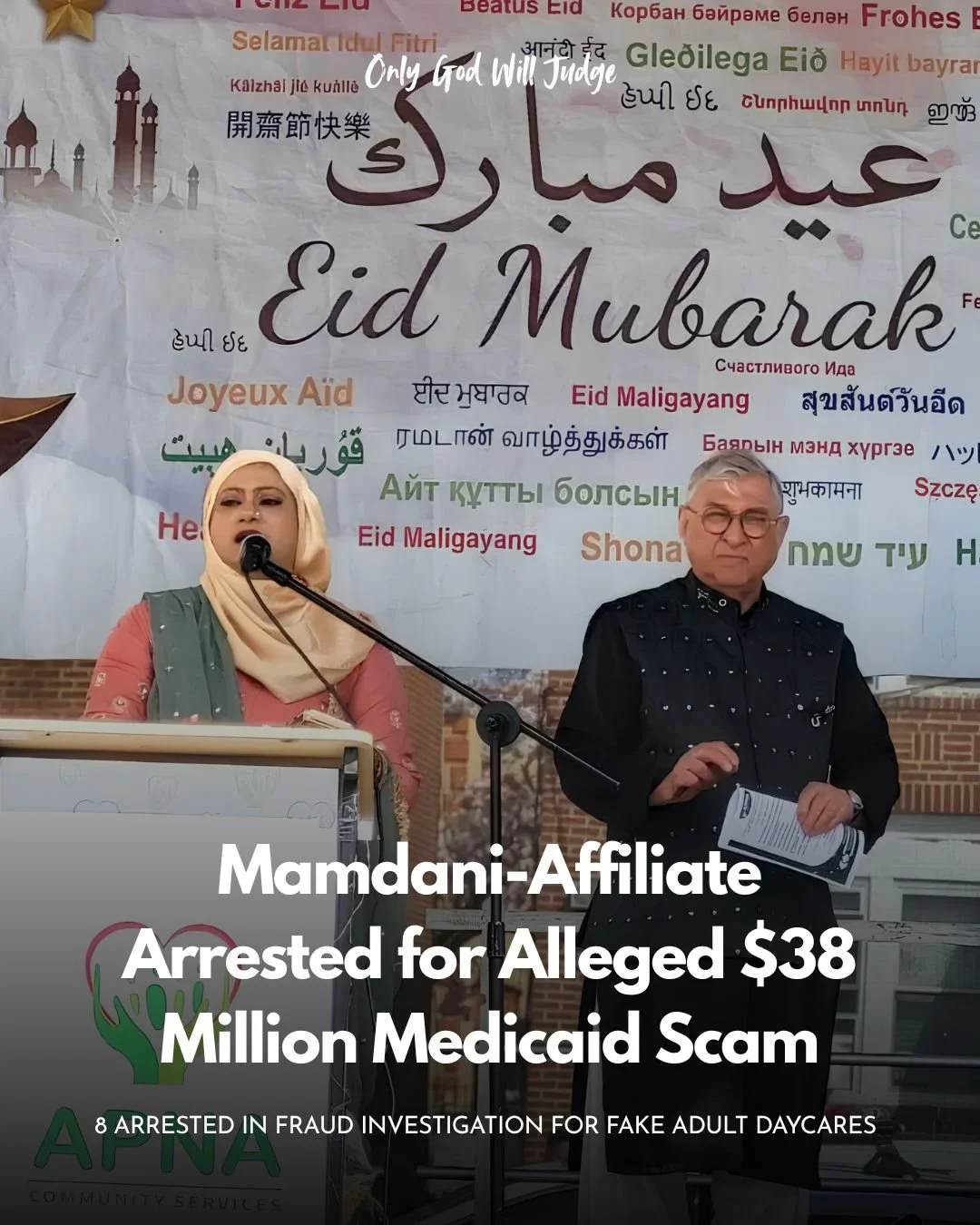 A woman in a hijab and a man with glasses standing in front of a banner that says Eid Mubarak and other holiday greetings in multiple languages. The woman is speaking into a microphone, and the man is holding papers.