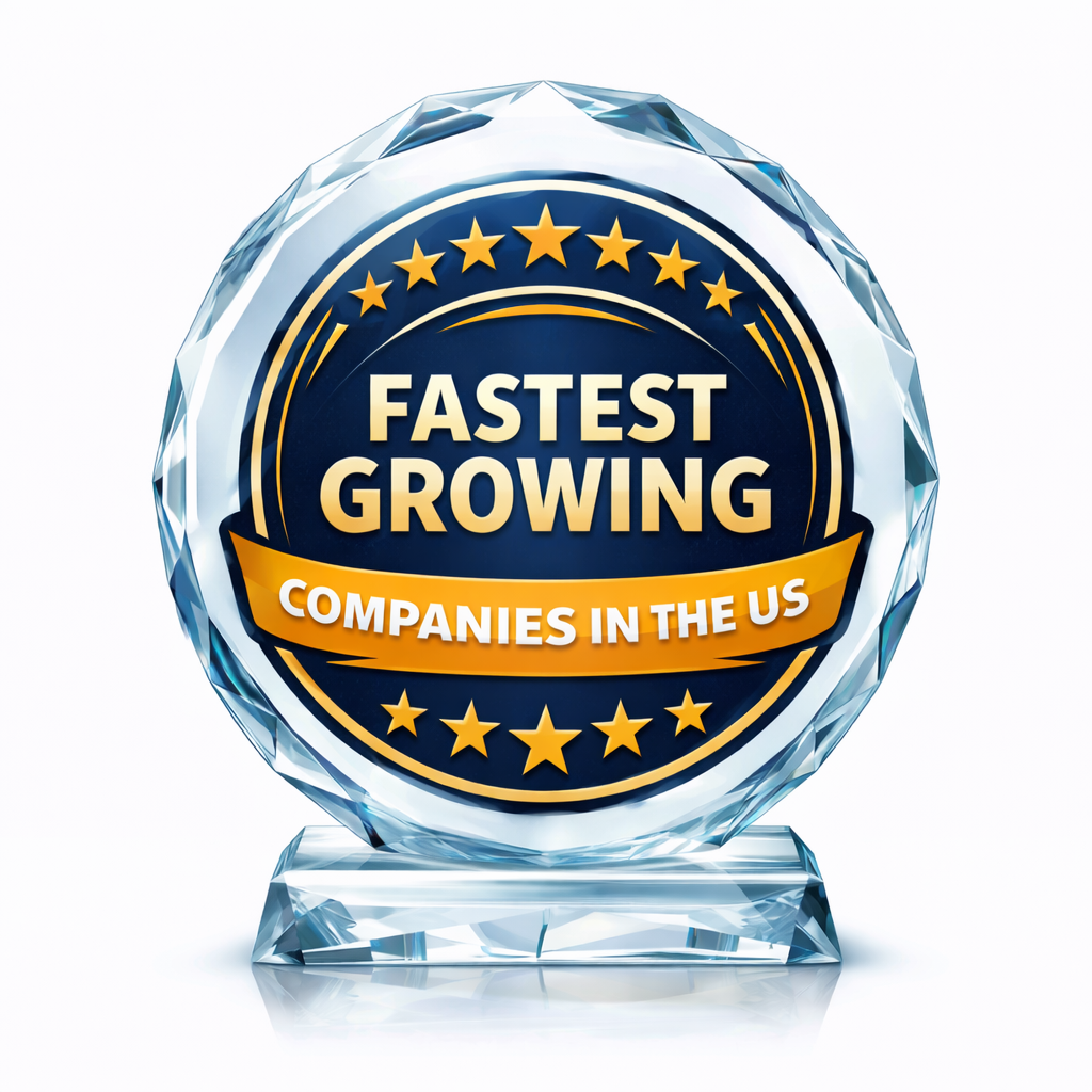 An award plaque with a crystal-like design, featuring a dark blue center with gold stars and text that reads "Fastest Growing Companies in the US".
