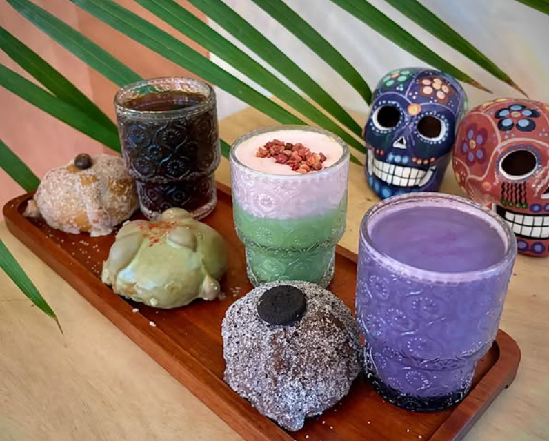 Specialty latte and conchas flight at Café Calaveras