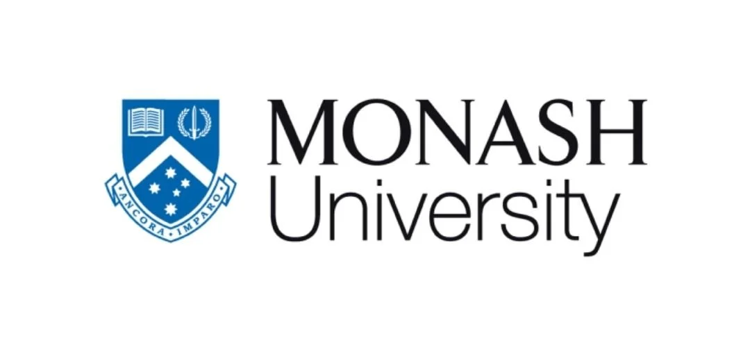 The Monash University logo featuring a blue shield with a book, a crescent moon, and a star, alongside the university name in black text.