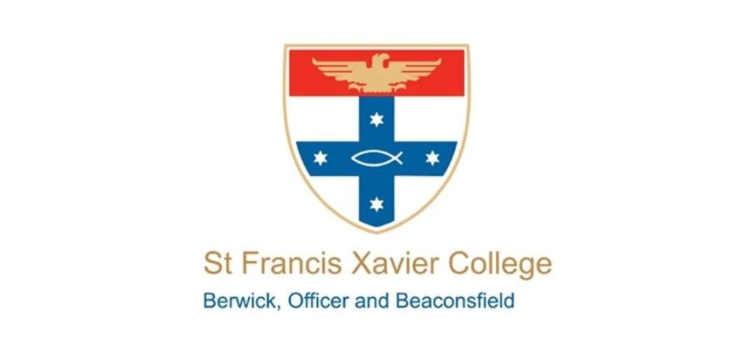 The shield emblem of St. Francis Xavier College with a cross, stars, and a fish, above the college name and location in Berwick, Officer, and Beaconsfield.