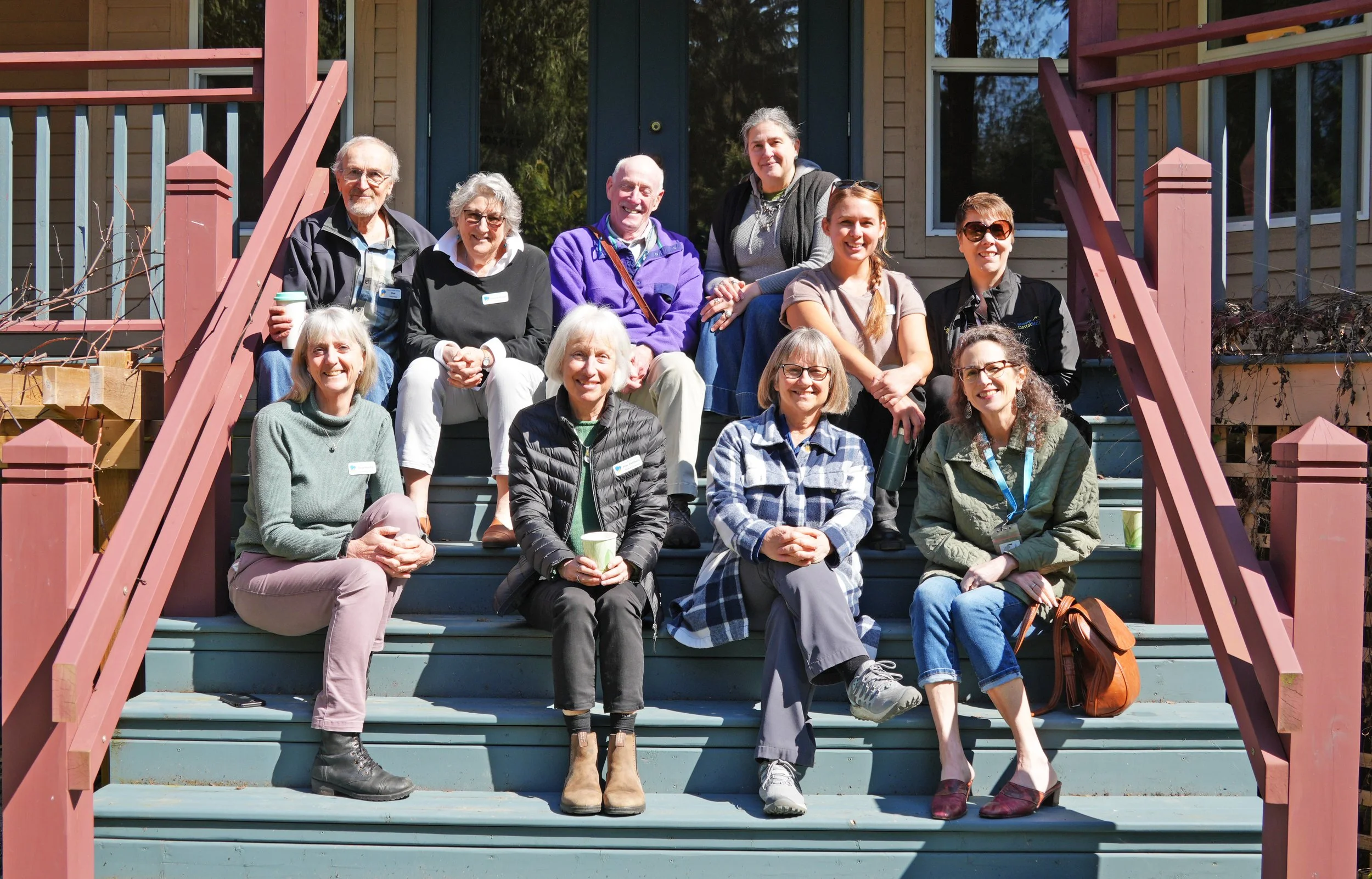 Coast Hospice staff and volunteers welcome Mossy Rock neighbours to tour the house.