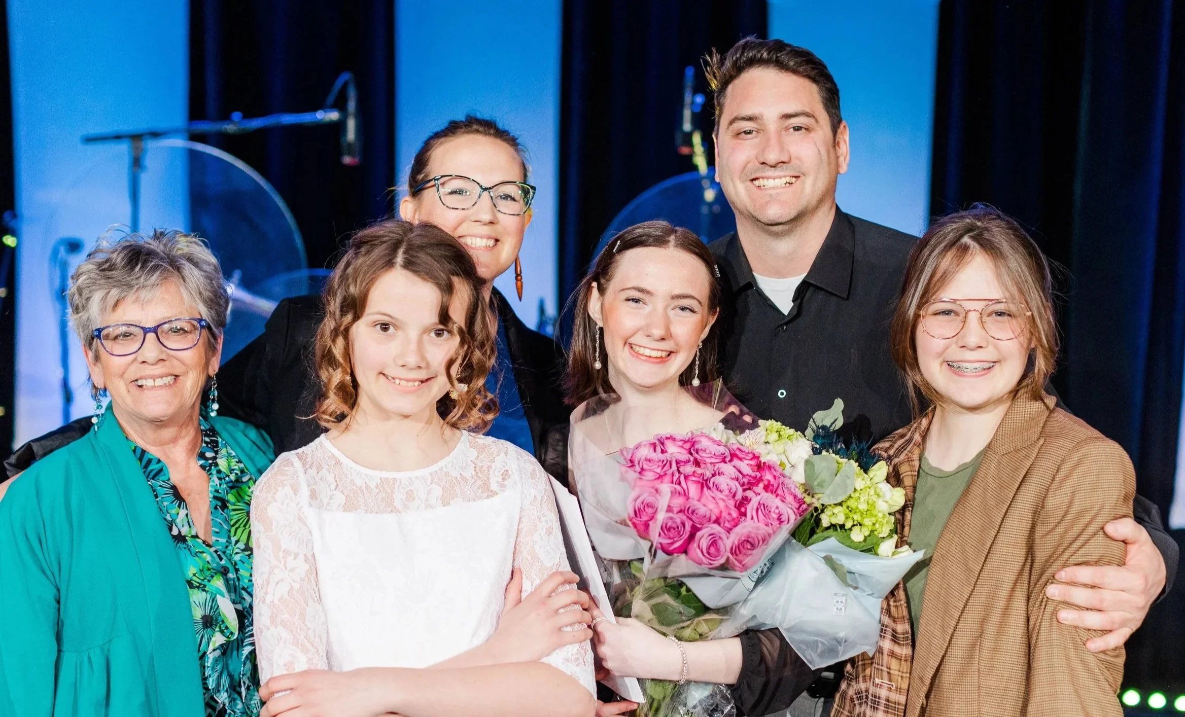 Sumner family posing at a special event.