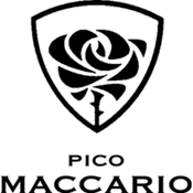 A black silhouette of a person sitting at a desk with a laptop and a cup, viewed from behind.