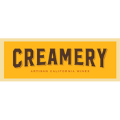 Creamery logo with yellow background and black text
