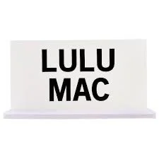 Sign with the words 'LULU MAC' in bold black letters on a white background.