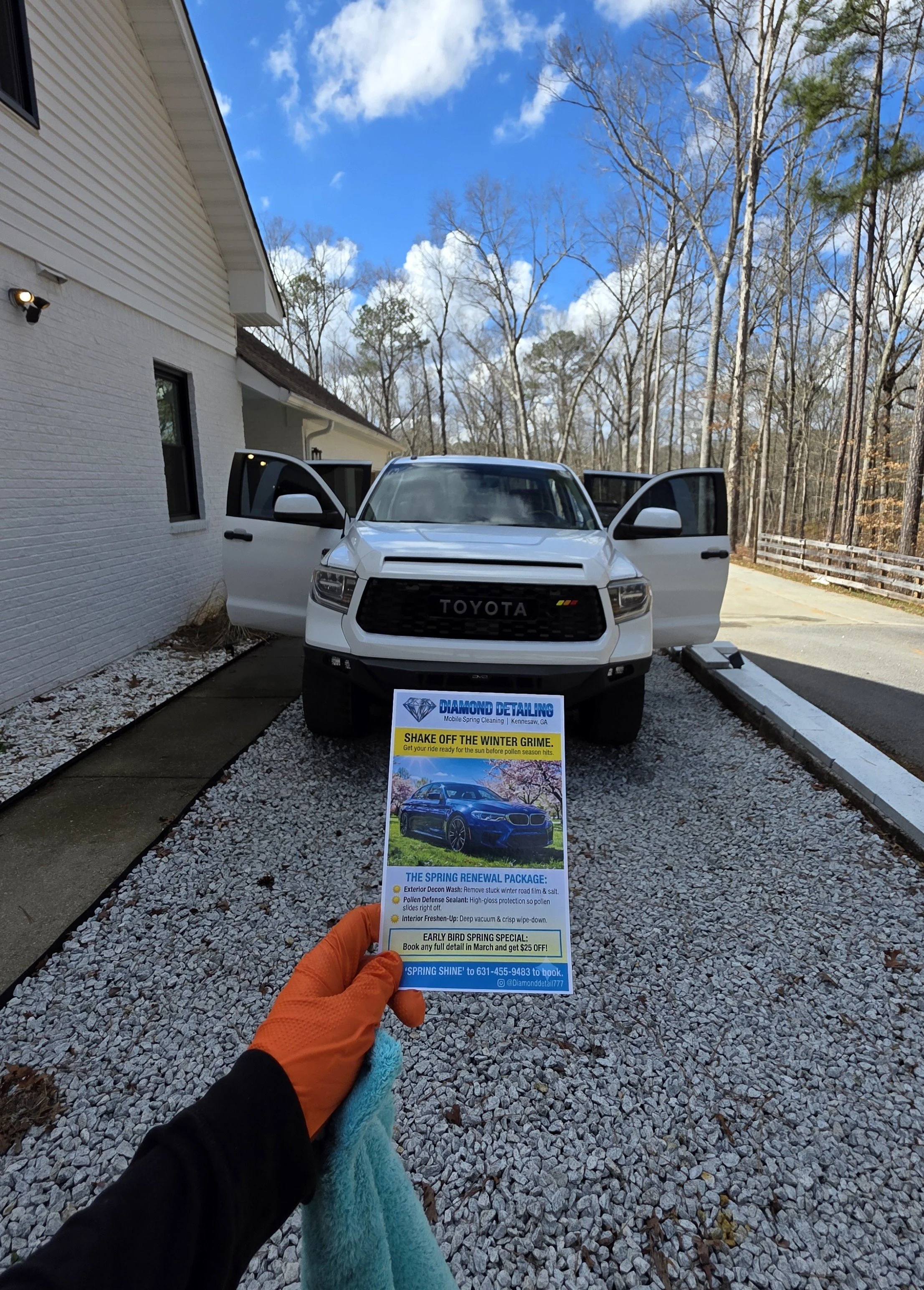 High-gloss show room finish and clay bar treatment on a luxury vehicle by Diamond Detailing