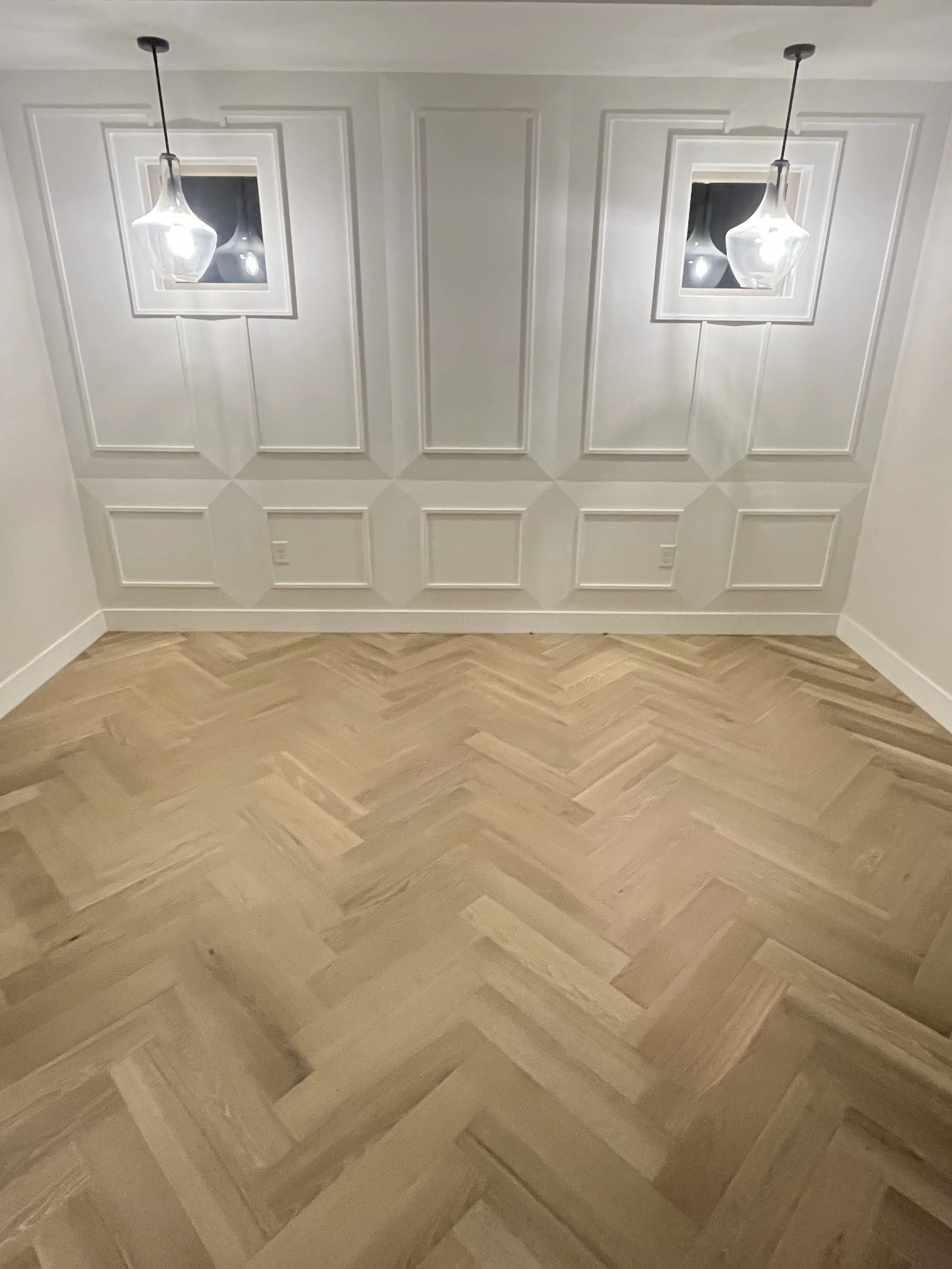 herrigbone flooring installation by aquila floors
