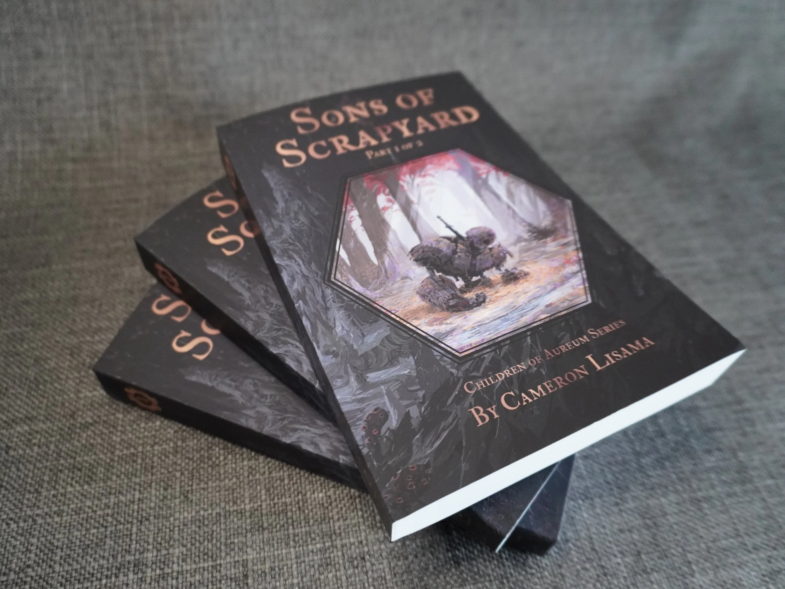 This is a product photo for the science fantasy action novel series, Sons of Scrapyard part 1, by Cameron Lisama.