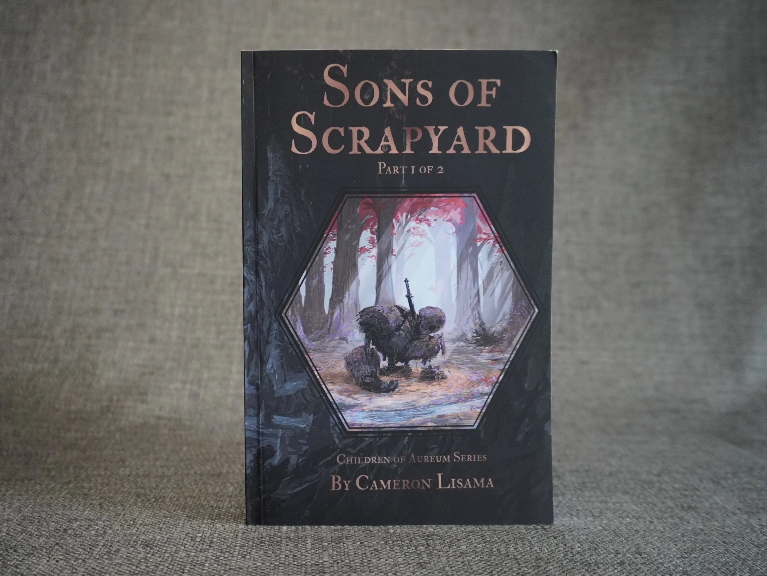 This is a product photo for the science fantasy action novel series, Sons of Scrapyard part 1, by Cameron Lisama.
