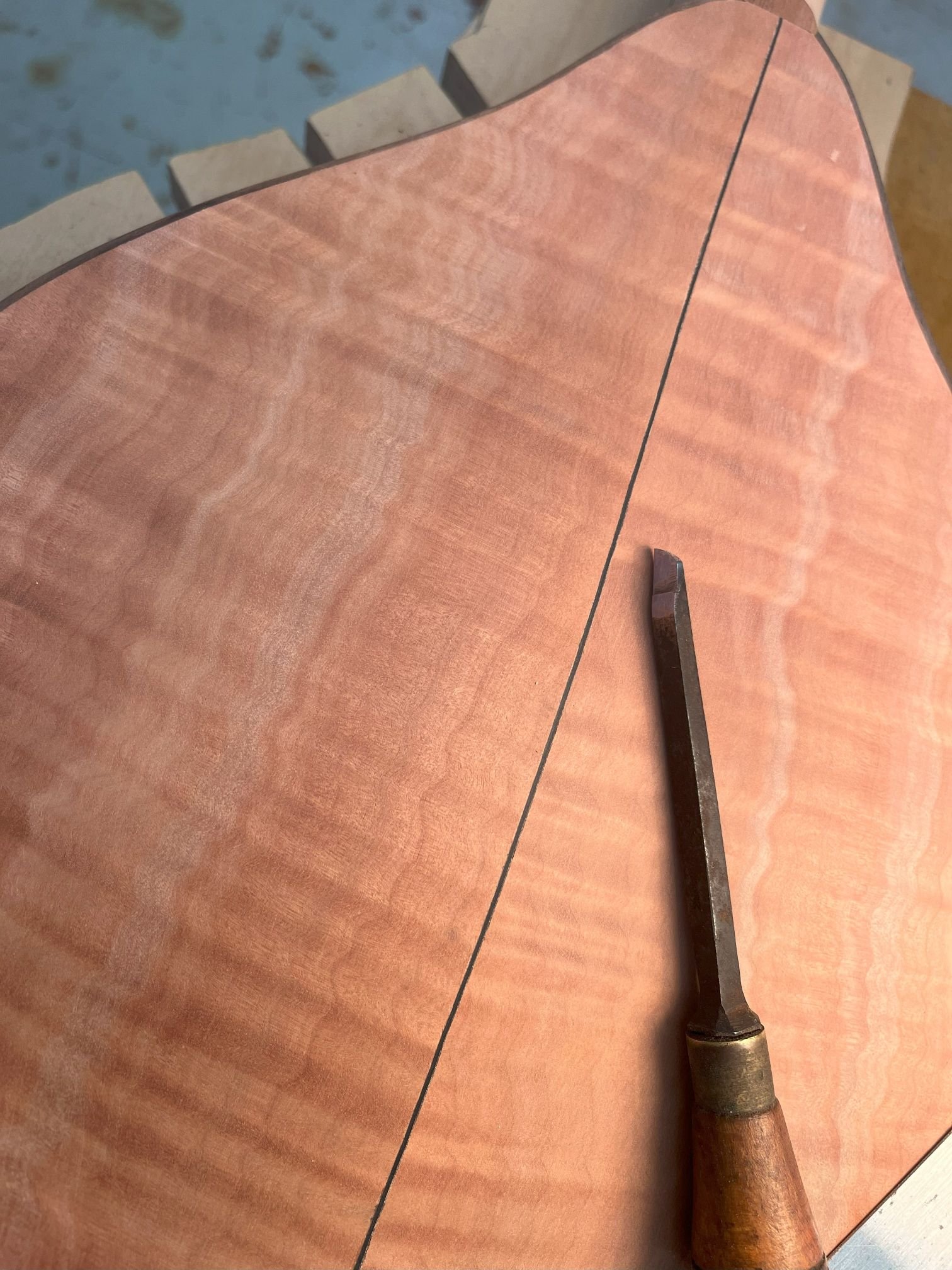 Ground a new chisel shape to make backstrip channel