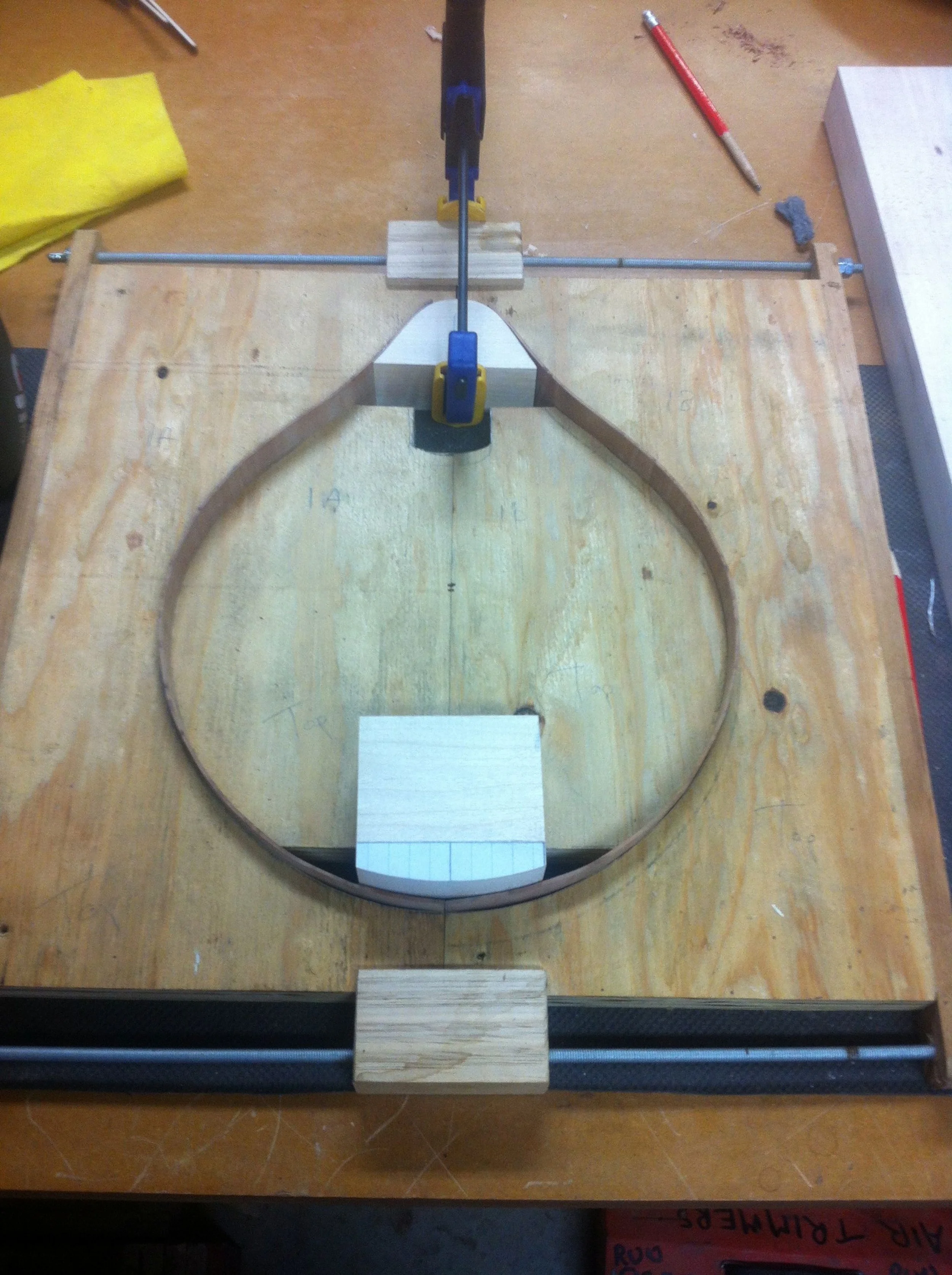 Sides in mould with neck and tail block