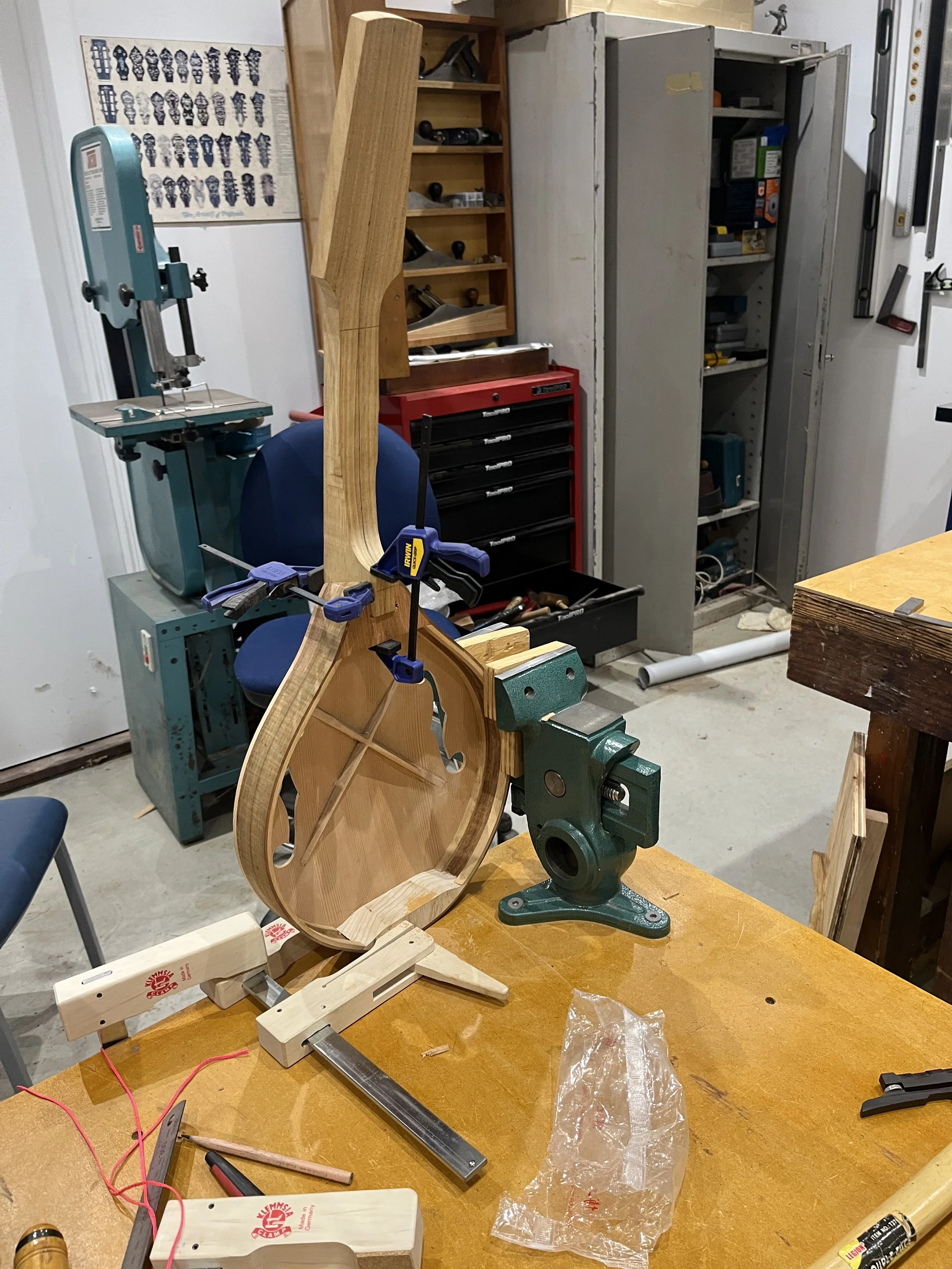 Neck joint being cut and tested.  The neck is finished before being attached.  The back covers the joint.