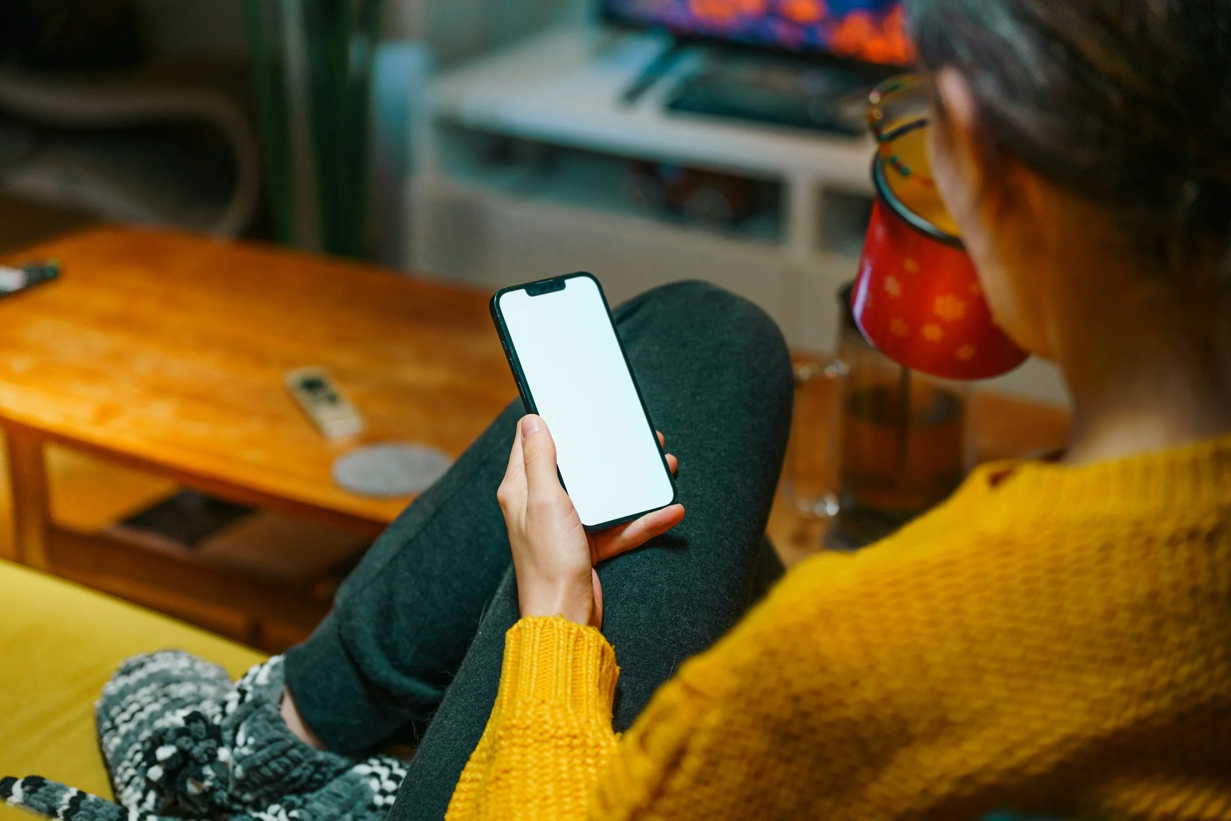 a woman reading on her phone