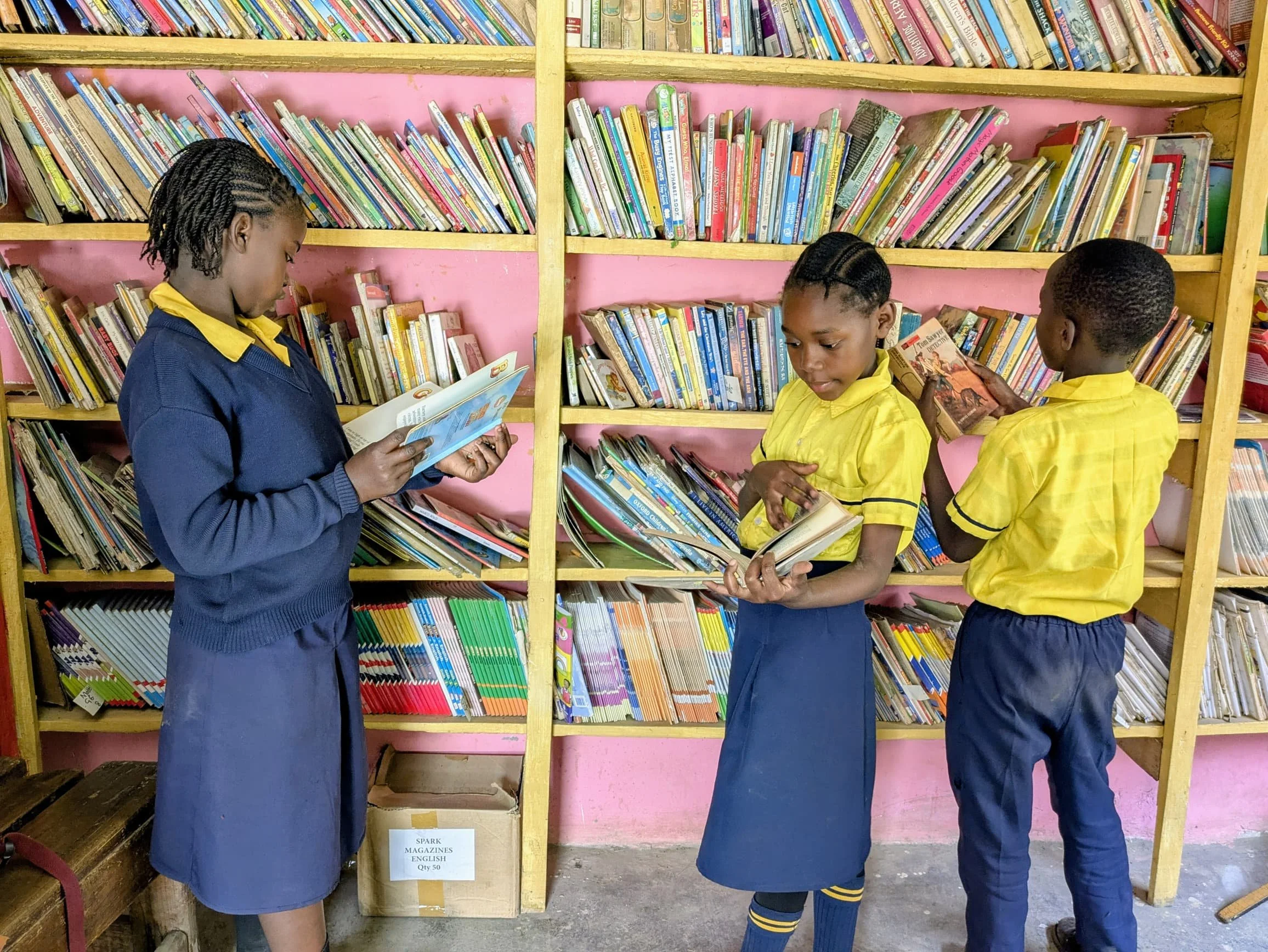 Students choose books to read during recess