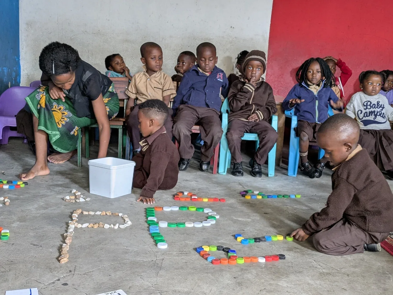 Students practice letter formation
