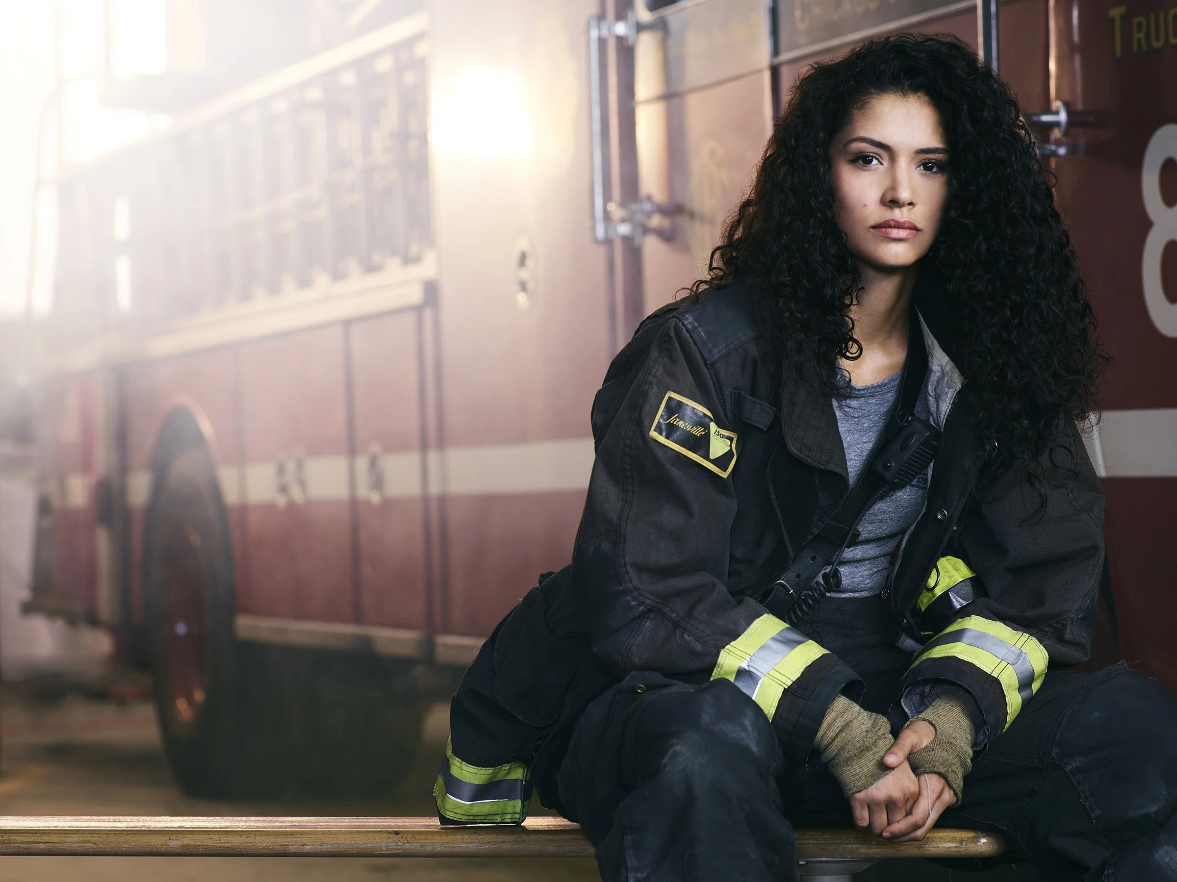 Key art portrait of Miranda Rae Mayo as Stella Kidd in Chicago Fire Season 6. Promotional campaign photography for the NBC firefighter drama series.