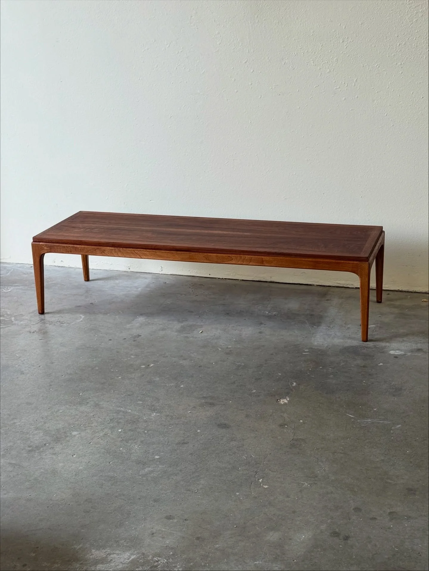 Vintage Lane MCM Coffee Table

1960s Lane Furniture Style No. 997-01. Beautiful walnut, clean mid-century lines, and classic tapered legs. Perfect for Danish Modern + MCM interiors. Structurally solid with light age wear.

57.75 x 19.5 x 14.25&rdquo;