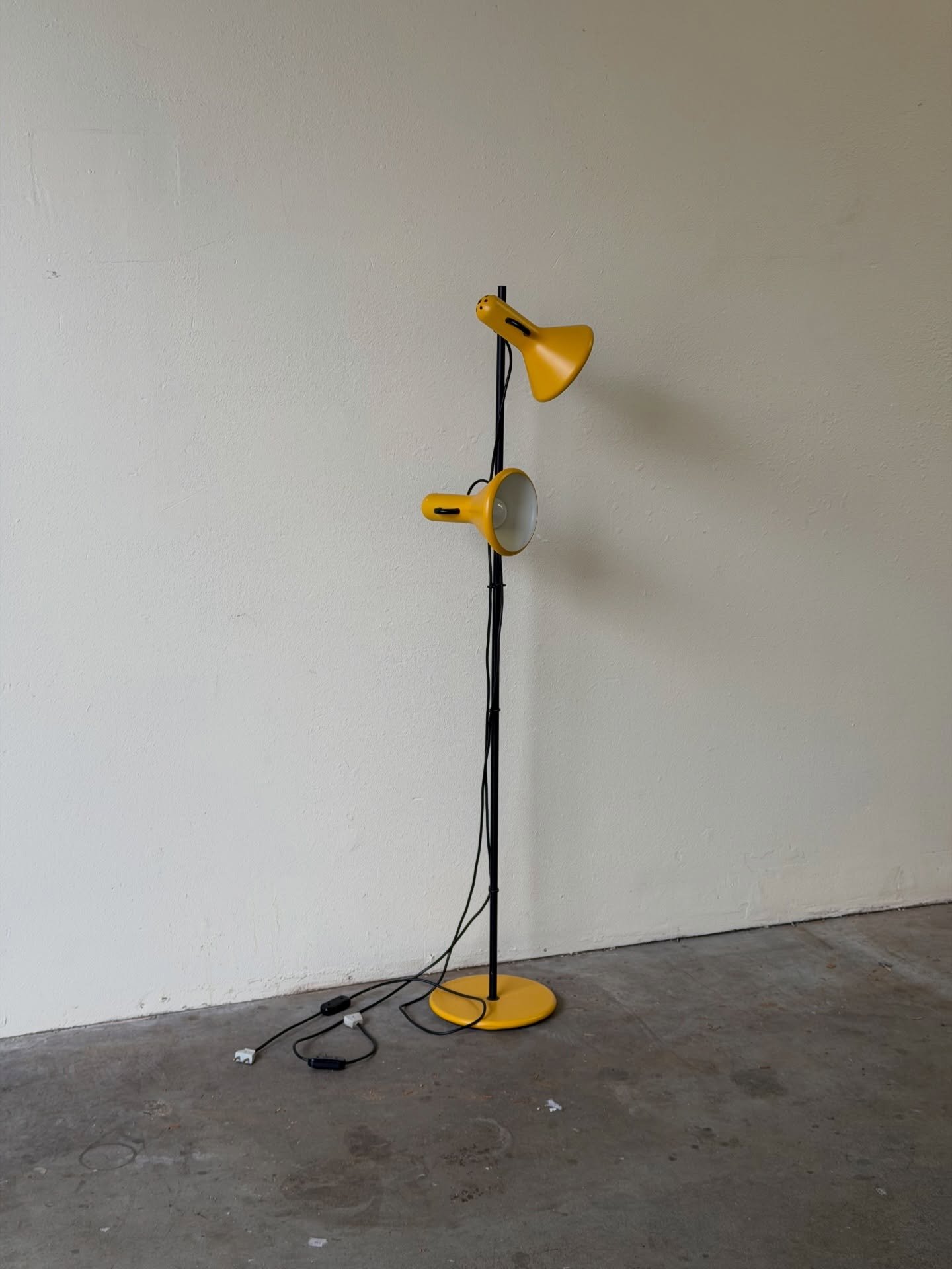 Vintage Danish floor lamp by RUMA, 1960s 🇩🇰
Bright yellow adjustable shades on a slim black stand &mdash; a playful and functional piece of Scandinavian design.

Both shades rotate so you can direct the light exactly where you need it.

$450

10x14
