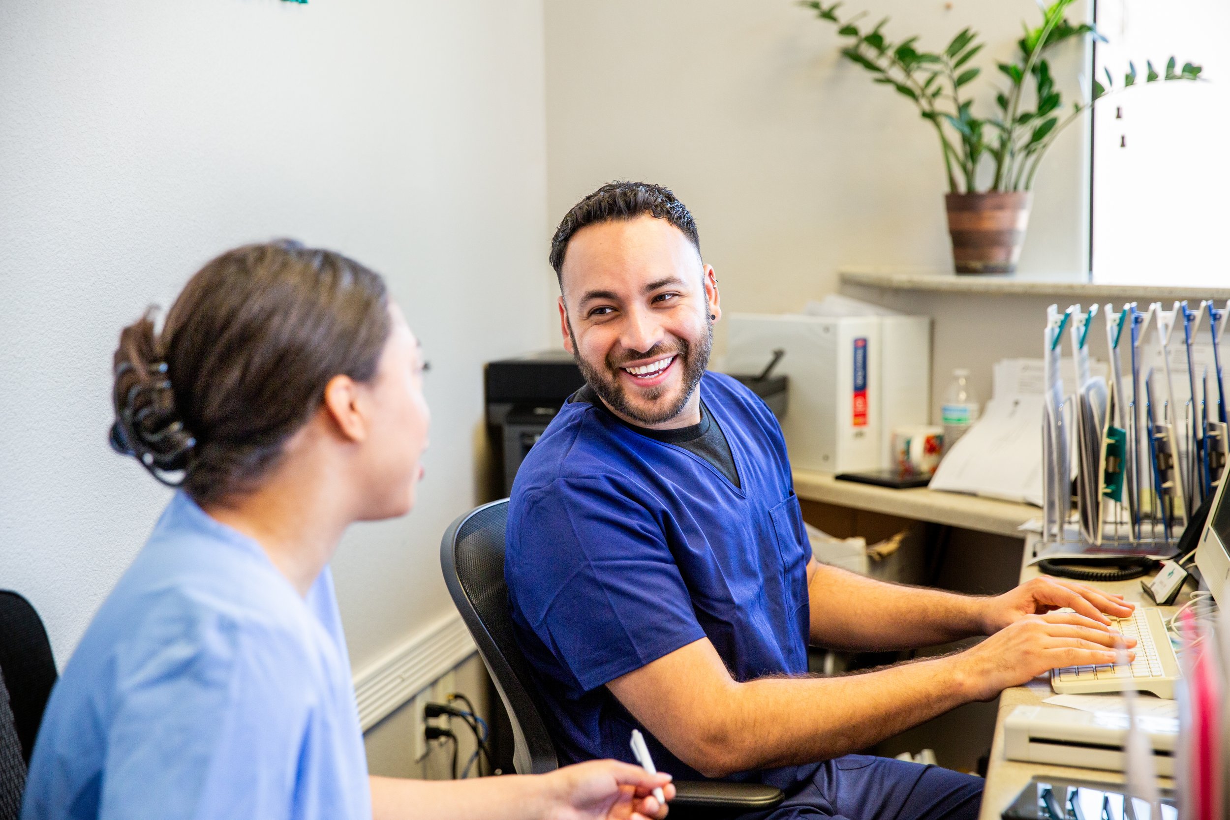 A nurse at work on a computer