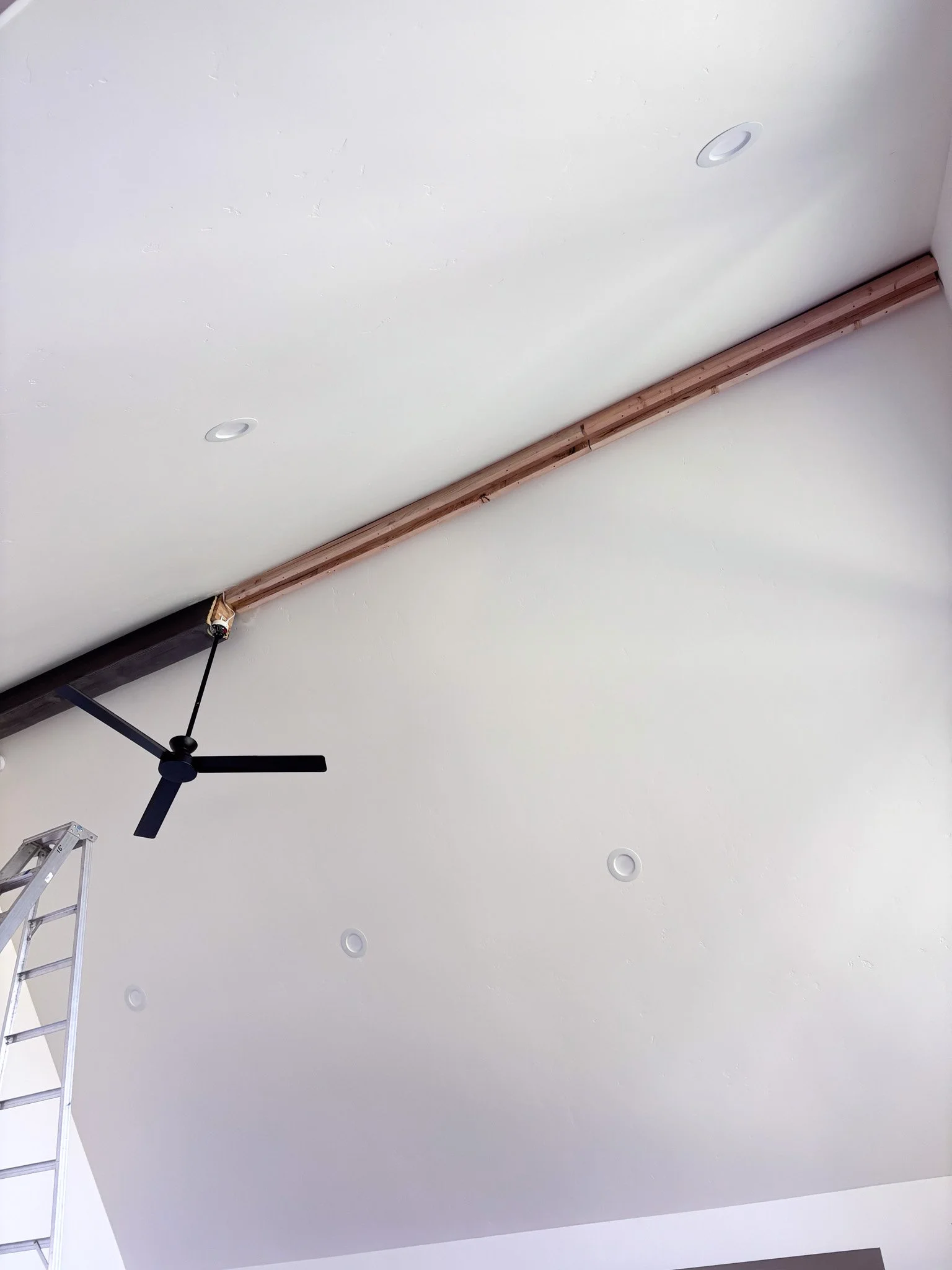 Another view of vaulted ceiling with half of faux ceiling beams added in Middleton, Idaho