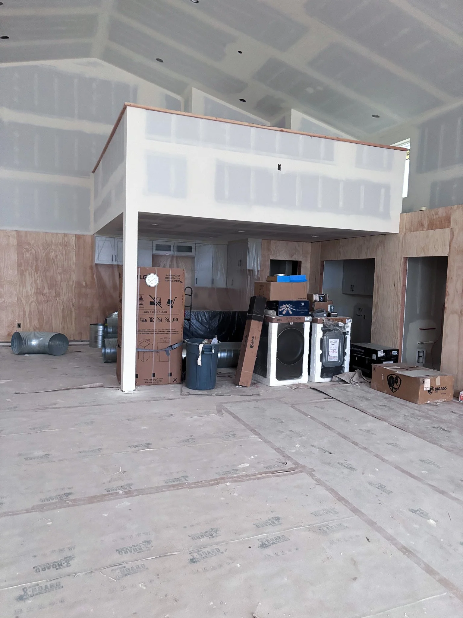 Large loft area under construction with drywall serving as a before picture of the wall paneling project in Eagle, Idaho