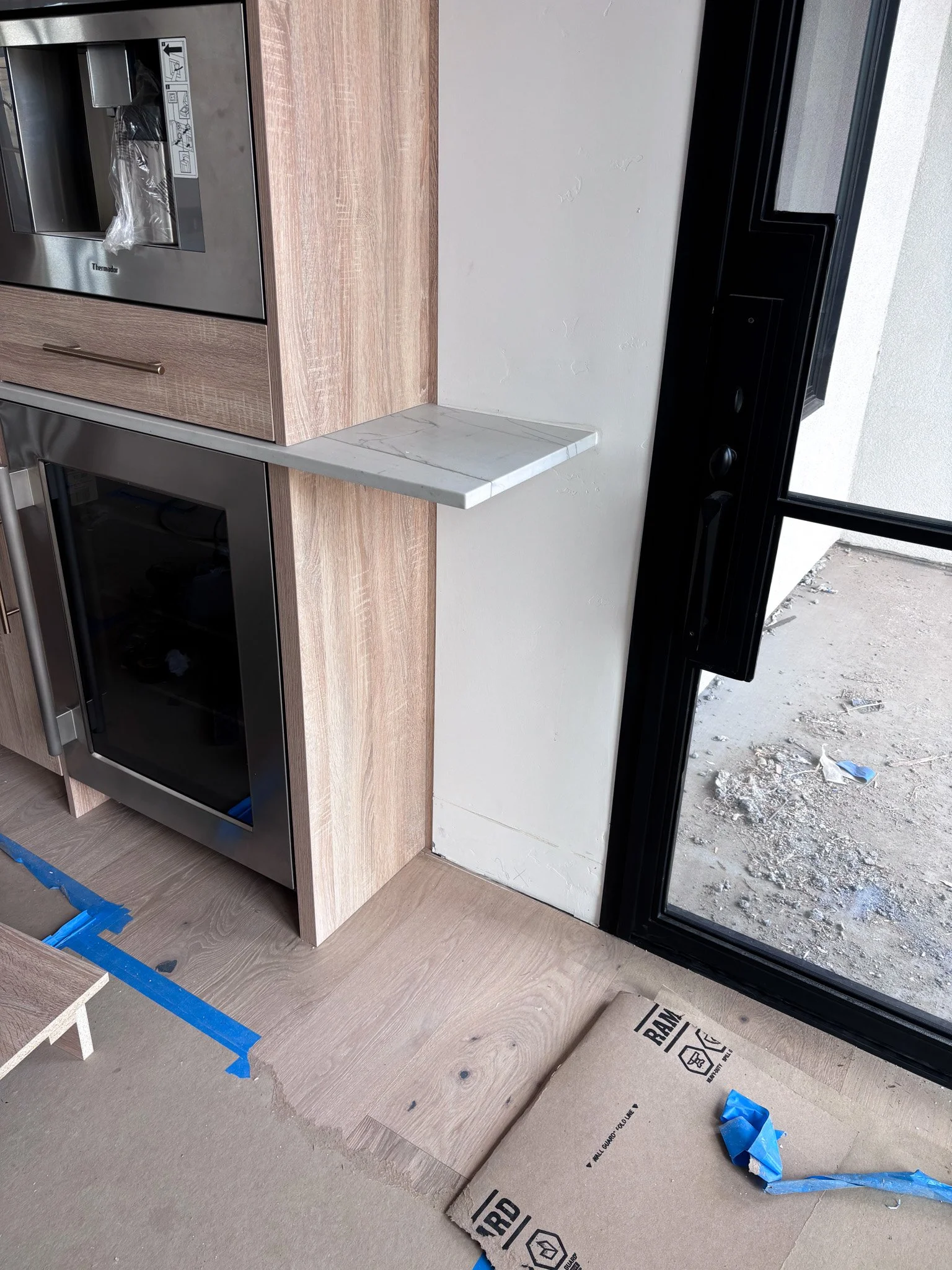 Different angle coffee bar showing countertop and cabinet misalignment in Eagle, Idaho