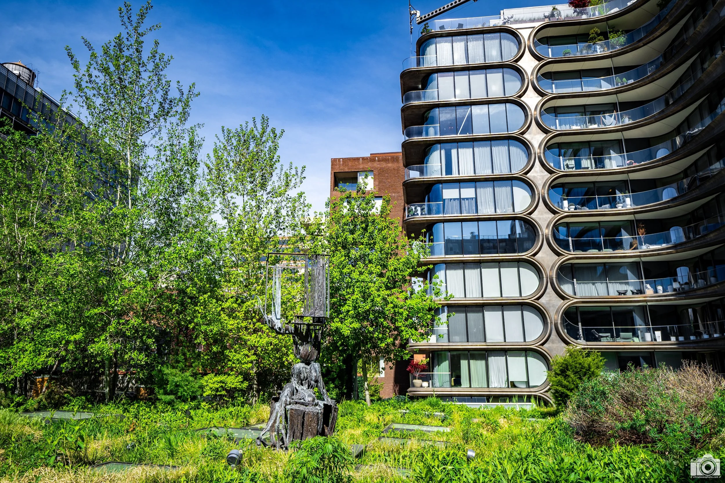 NYC 2025 - The Wooden Maiden.  Shot with a Sony a7c // 12-24mm G @ 24mm f/4 ISO 125 - 1/250s.