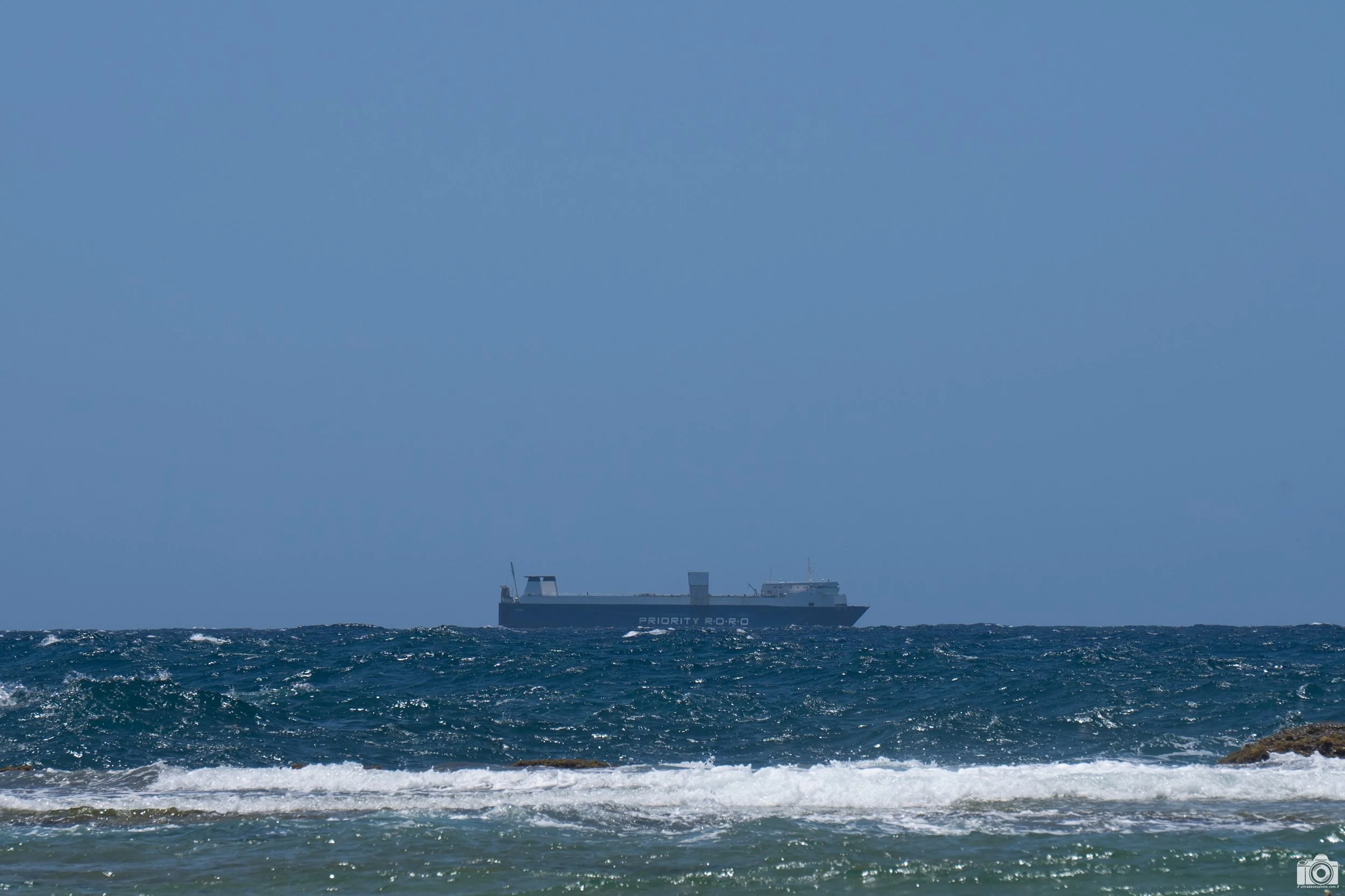 Puerto Rico, USA 2022.  PRIORITY R•O•R•O.  This vessel transports vehicles, containers, or heavy equipment across the Caribbean Ocean between PR and the Dominican Republic.  Shot taken with a Sony a7c // E 55-210mm OSS @ 256mm - ISO 100 - f/11 - 1/40