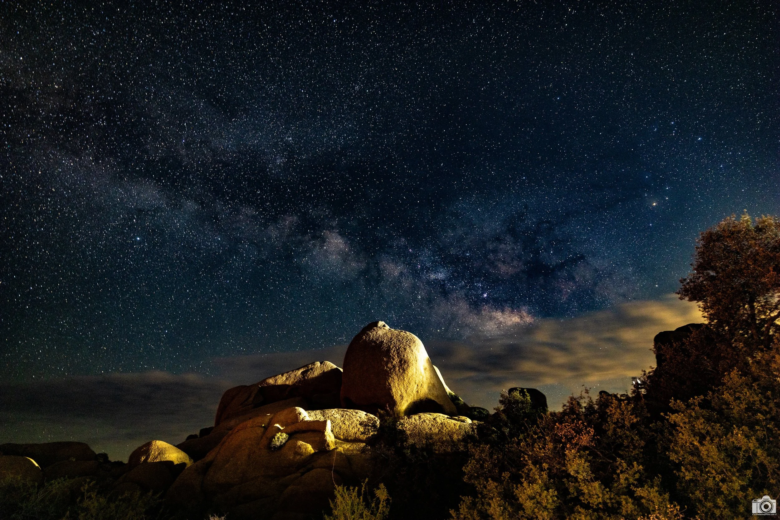 2026 - Milky Way above the Skull...

There is a larger rock mass located in front of Skull Rock, so from the street level, you can't get the full view.  You can if you situate yourself across the street on from on top of another rock mass.

Shot with